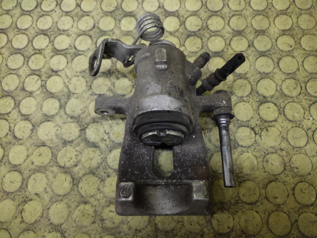 OPEL ZAFIRA A caliper HAMILCOWY left rear part