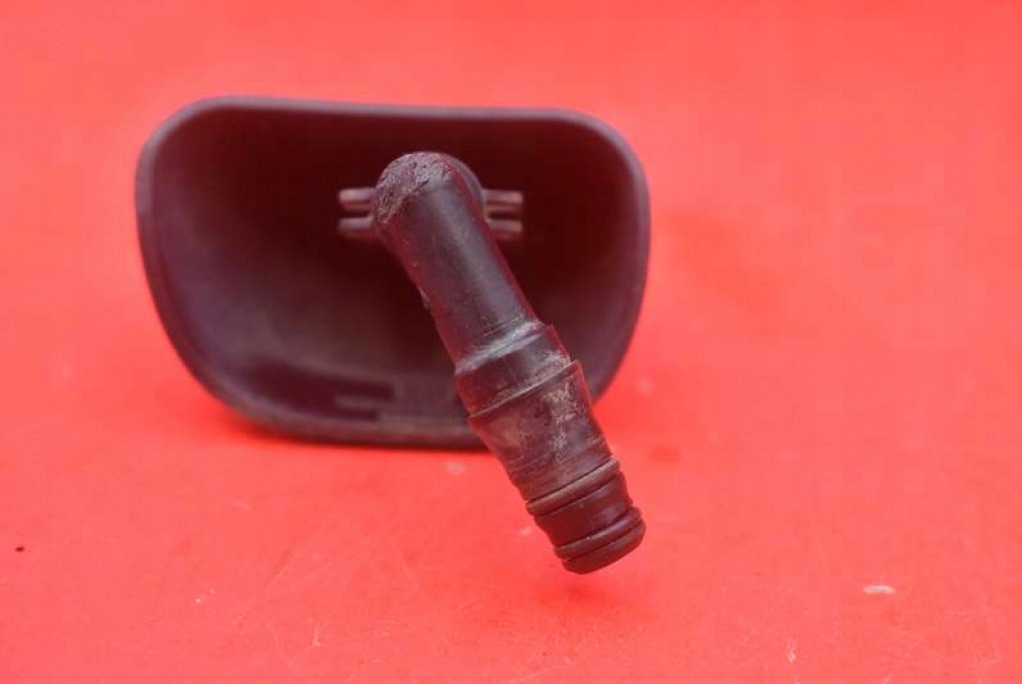 washer REFLEKTOROW left 90559588 OPEL ASTRA 2 II G 98-09