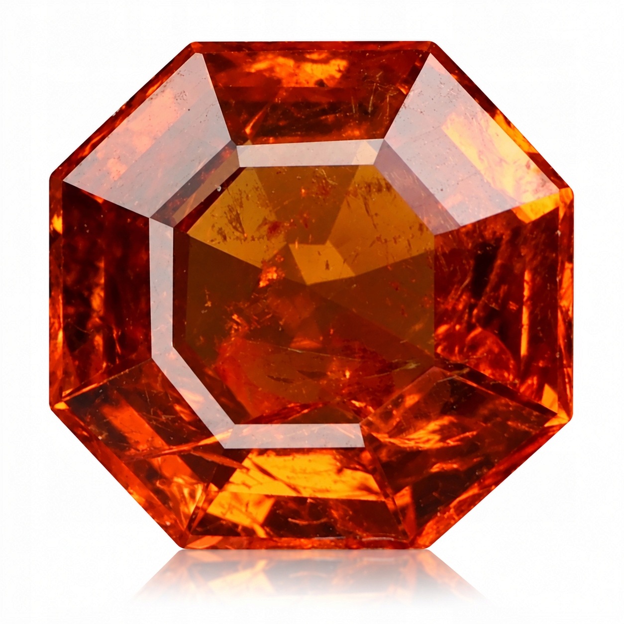 Přírodní granát Spessartyn 1.32 ct Heksagon Namibie I1 certifikát Wbd