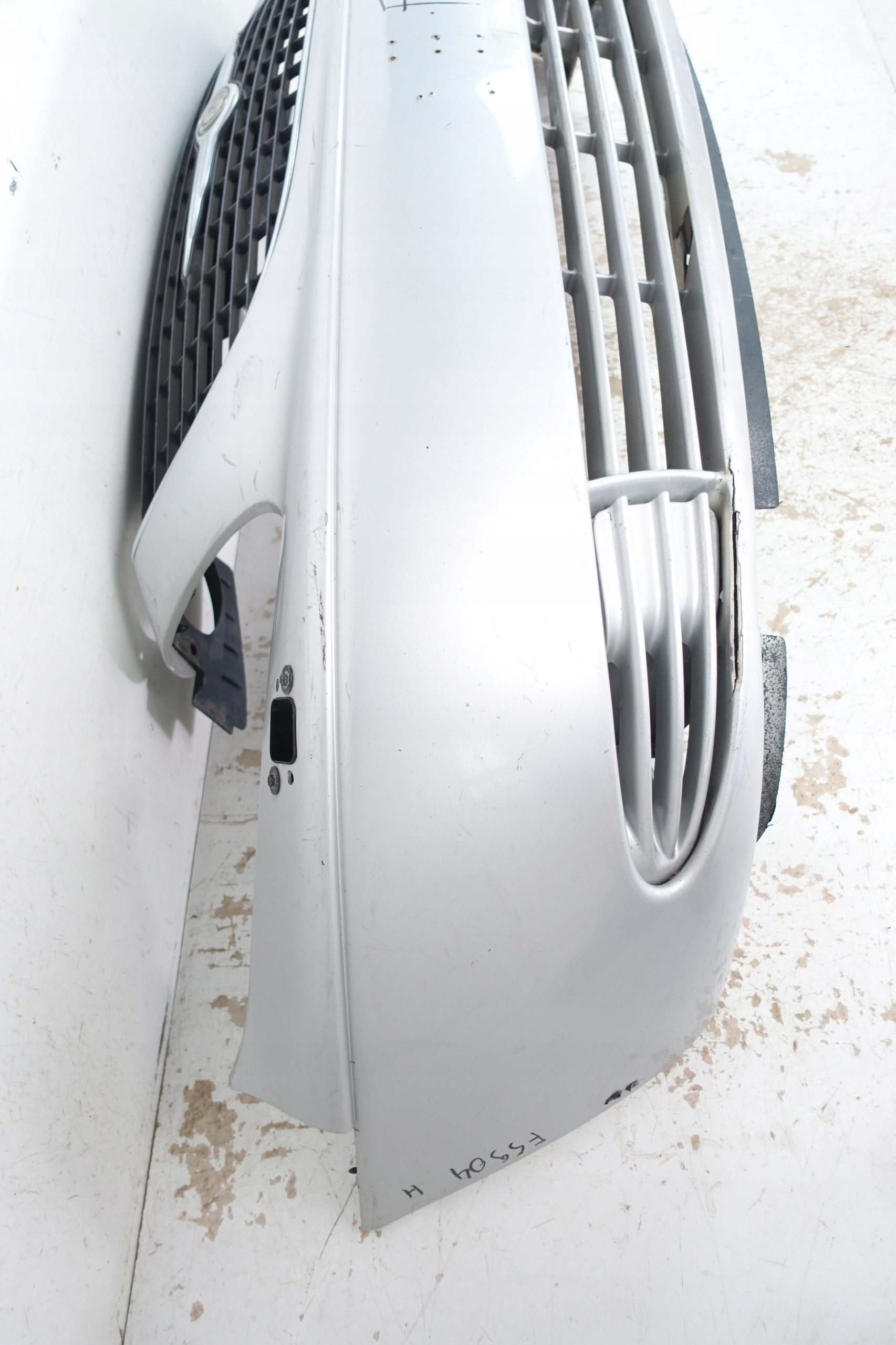 CHRYSLER VOYAGER IV 2000- bumper front front 04857388AA