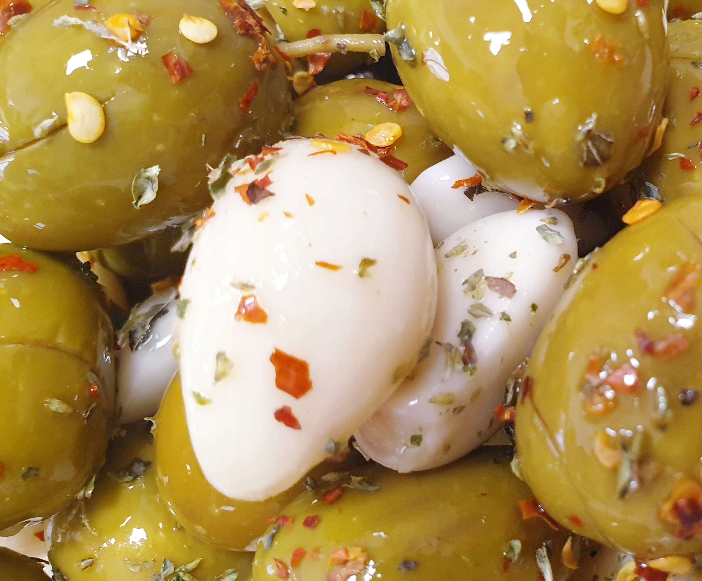 

Oliwki Zielone z pestką z czosnkiem pikantne 250g