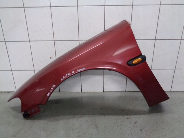 OPEL VECTRA B 97 BŁOTNIK LEWY PRZÓD PRZEDNI L549