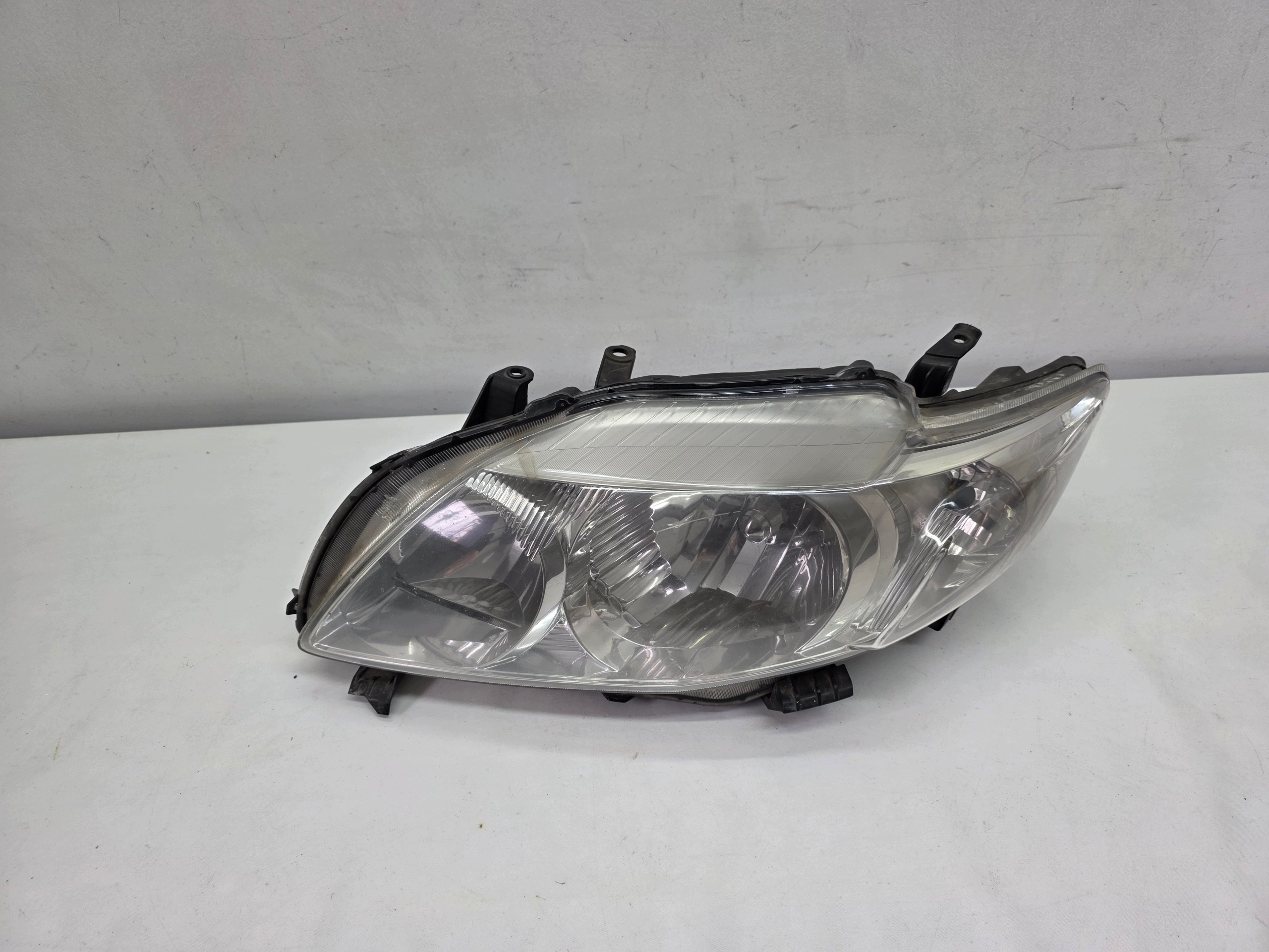 TOYOTA COROLLA E15 07-10 light REFLEKTOR left front original EUROPA