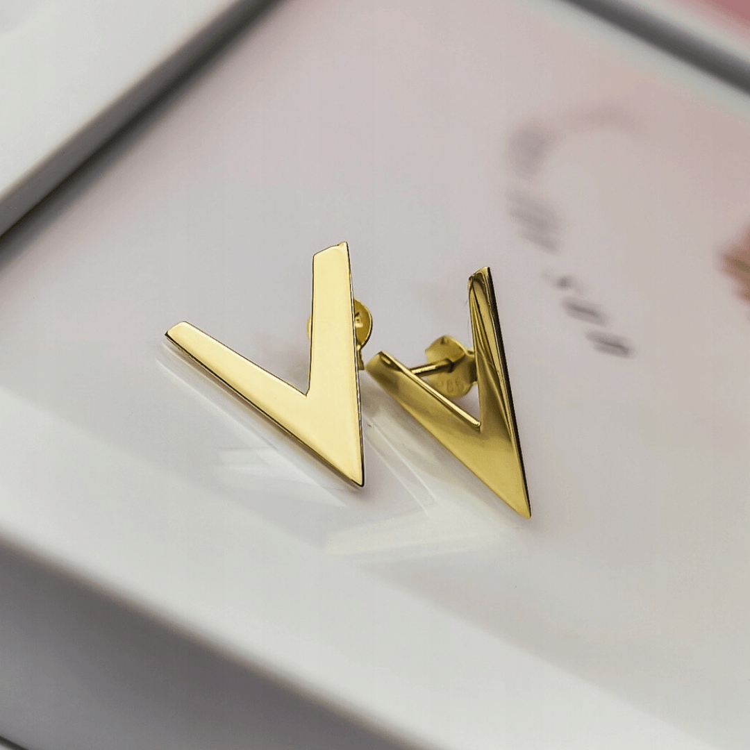 Zlaté náušnice V pr.585