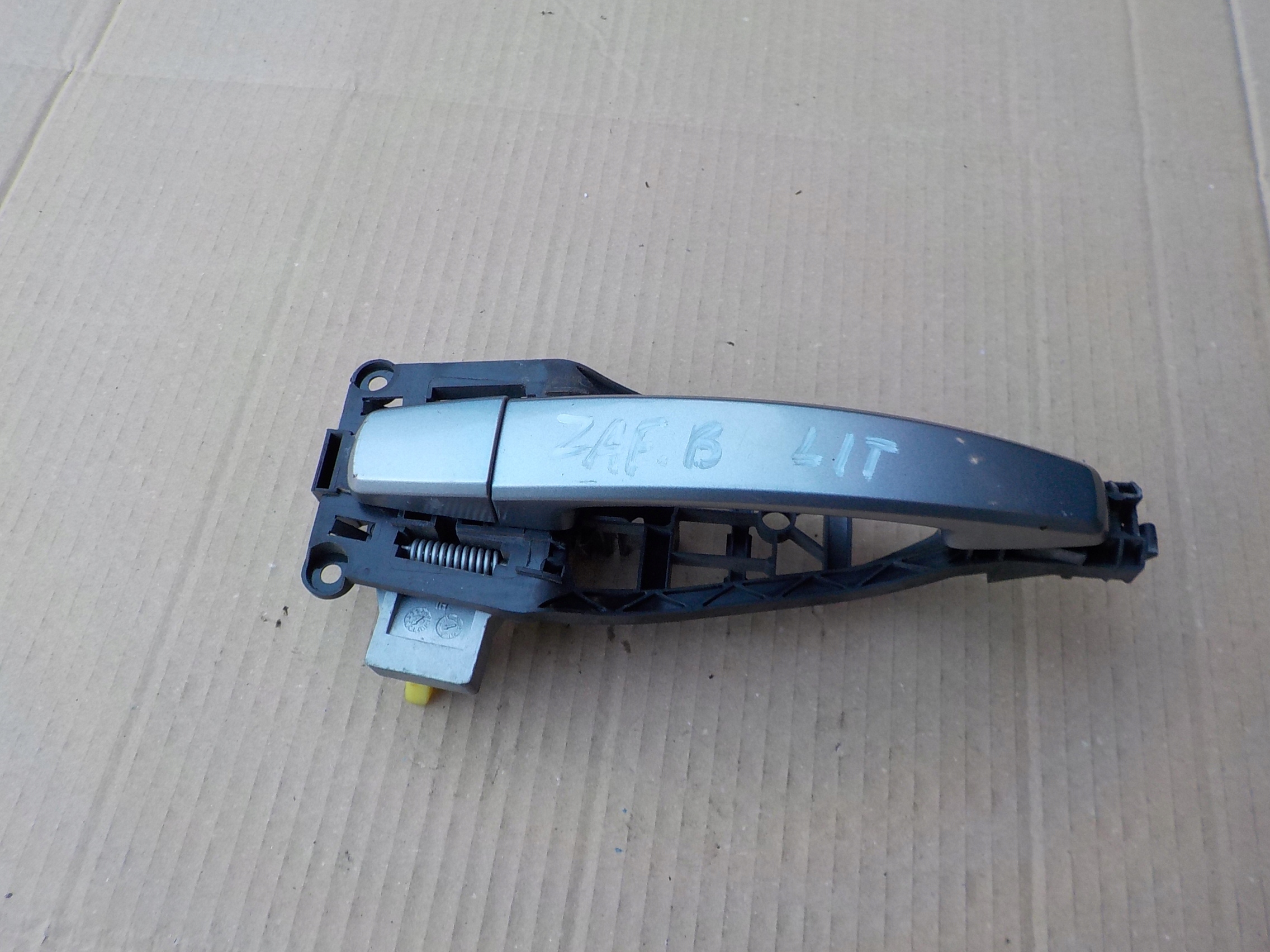 handle left rear part opel zafira b 2006r