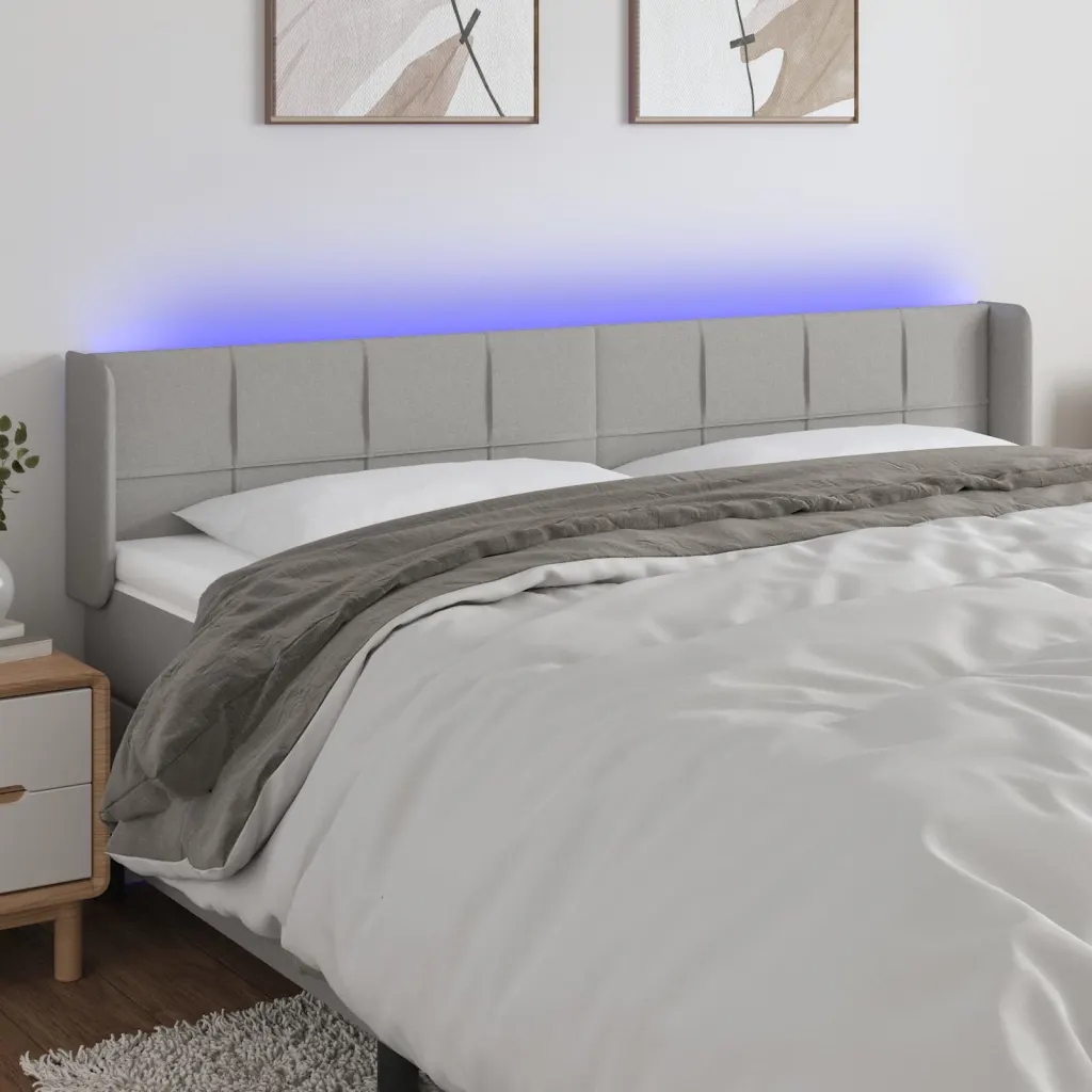 Čelo postele s Led světle šedé 183 x 16 x 78/88 cm textil Šedá 3123250