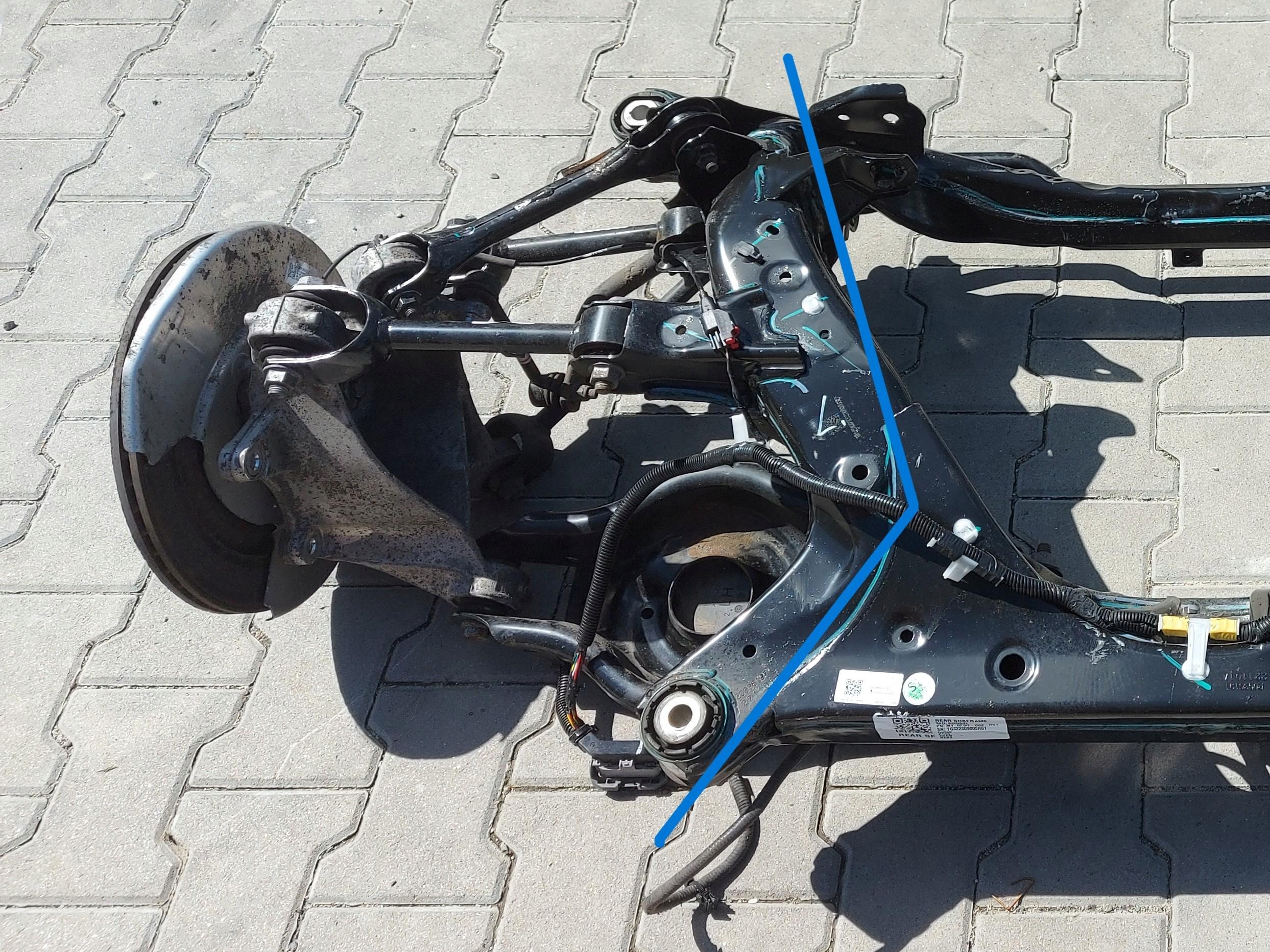 TESLA MODEL Y 2022r sususpension left rear part rear. left side