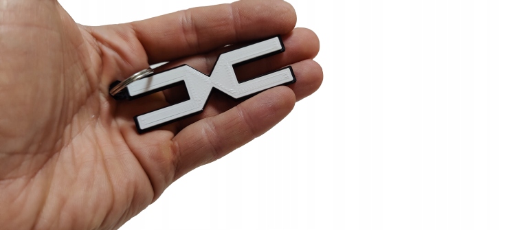 

Brelok Dacia nowe logo koncept breloczek Duster