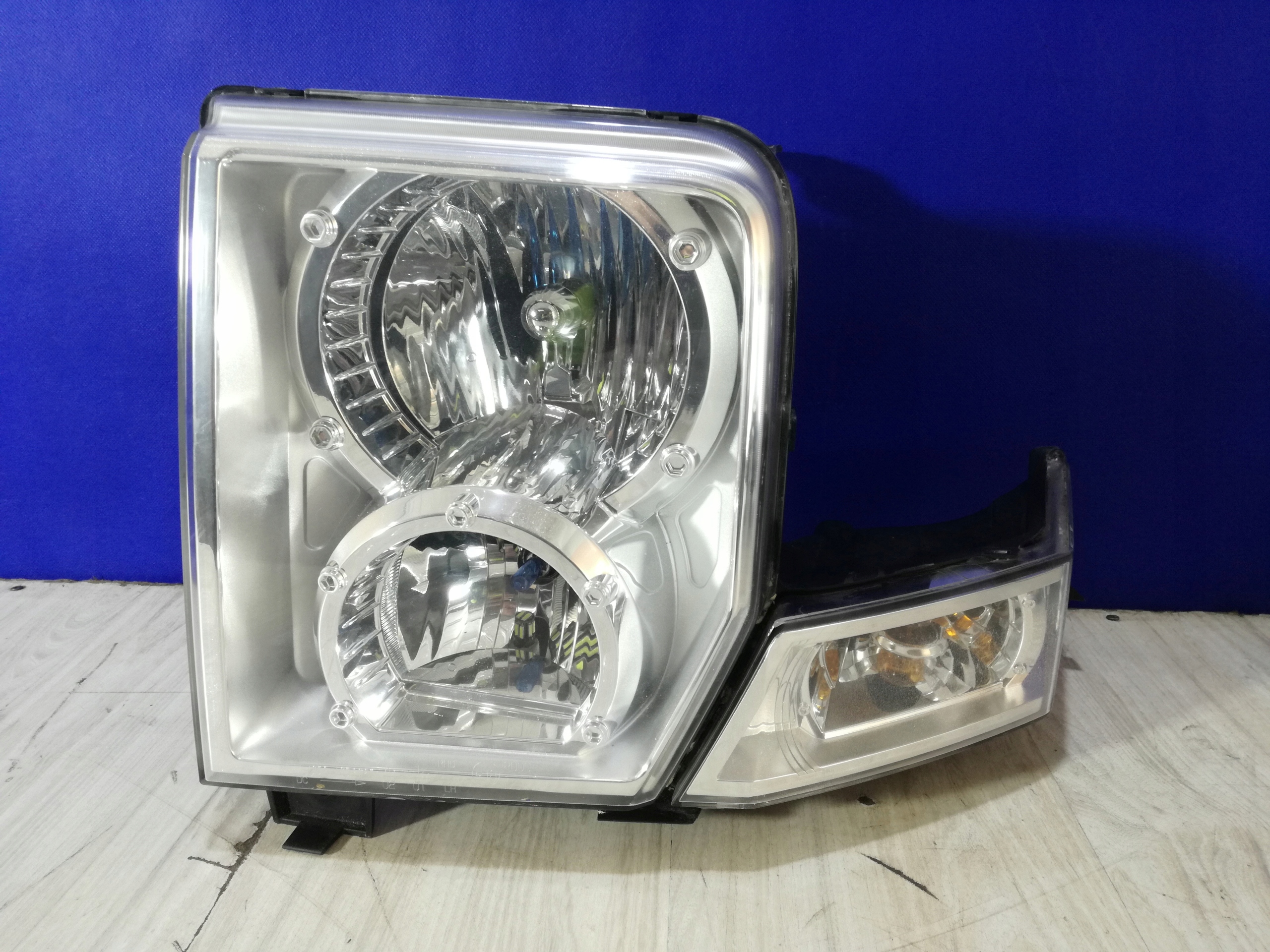 Jeep Commander 05/10 lampa reflektor lewa przód Anglik
