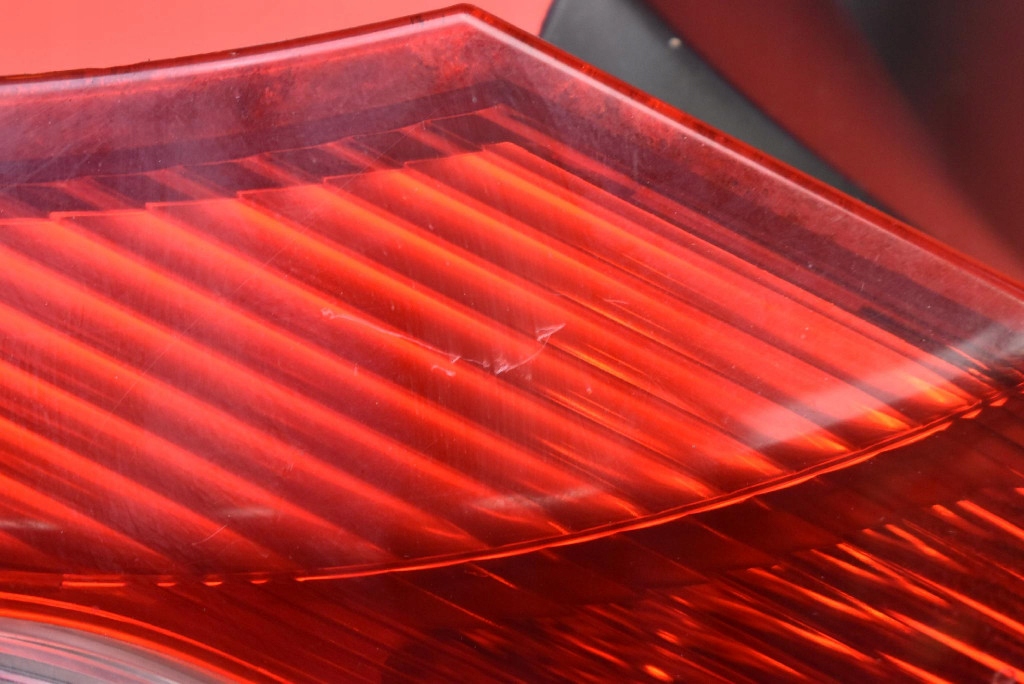 фонарь левый 220-87977 mitsubishi LANCER 8 VIII 5D HB 07-16