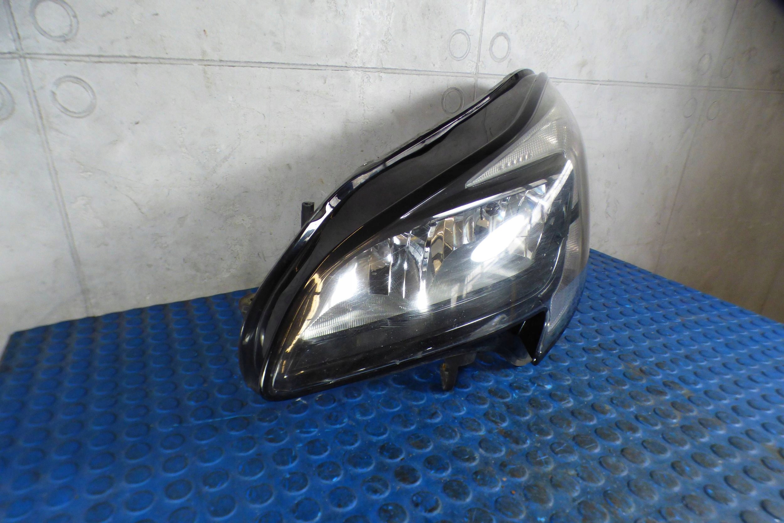 Opel Corsa E reflektor light left 13381335 original st.BDB