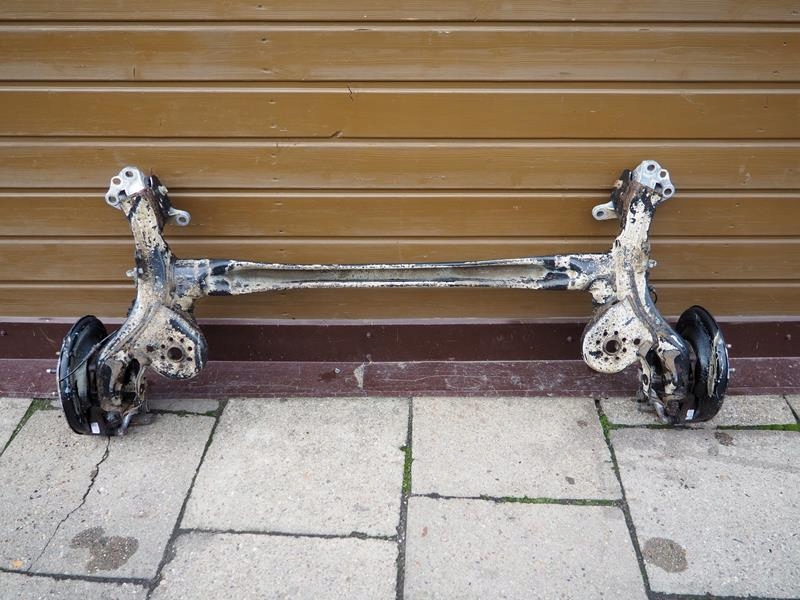 OŚ BELKA TYLNA TARCZE OPEL ASTRA V K Producent części Opel OE