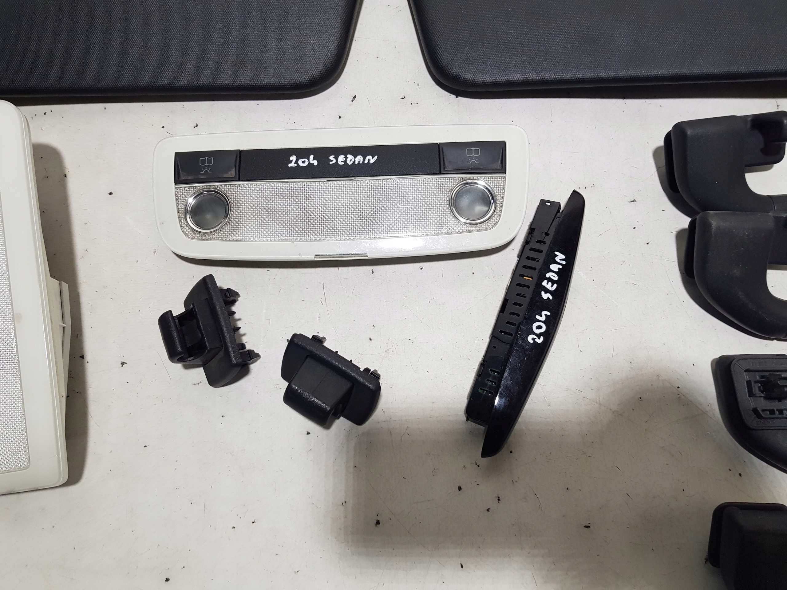 MERCEDES W204 sedan AMG black, inner pillars light plastics