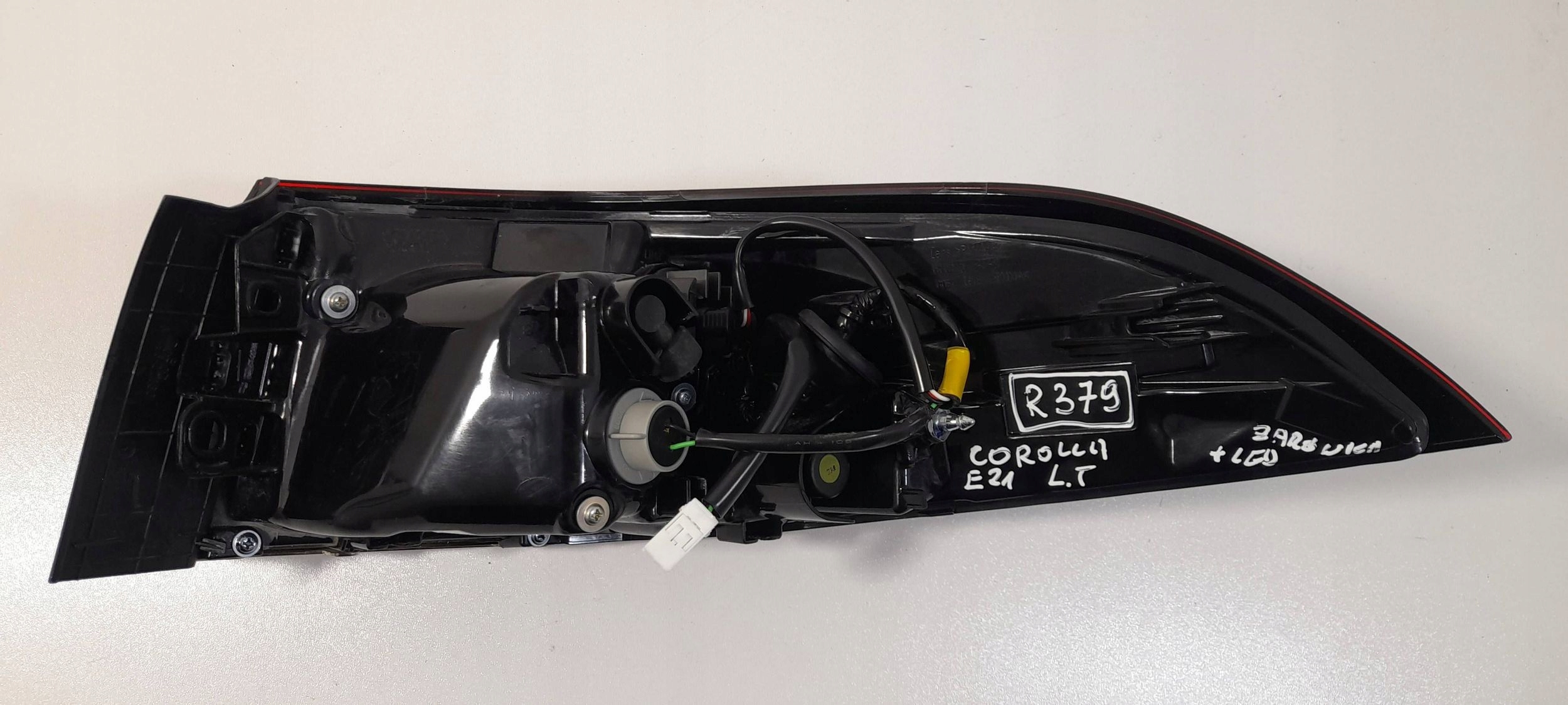 Toyota Corolla E21 sedan light rear left 8149802060 (R379)
