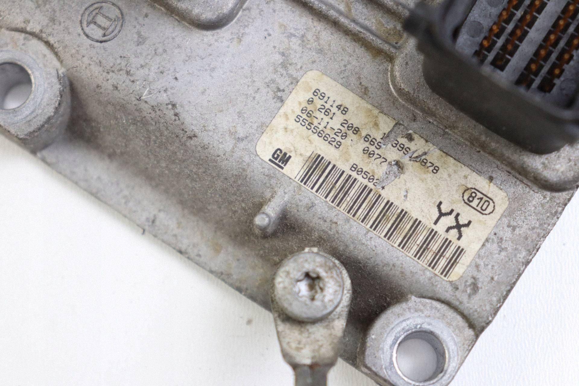 OPEL ASTRA G II computer control unit of the engine ECU 1.4 0261208669 55556629