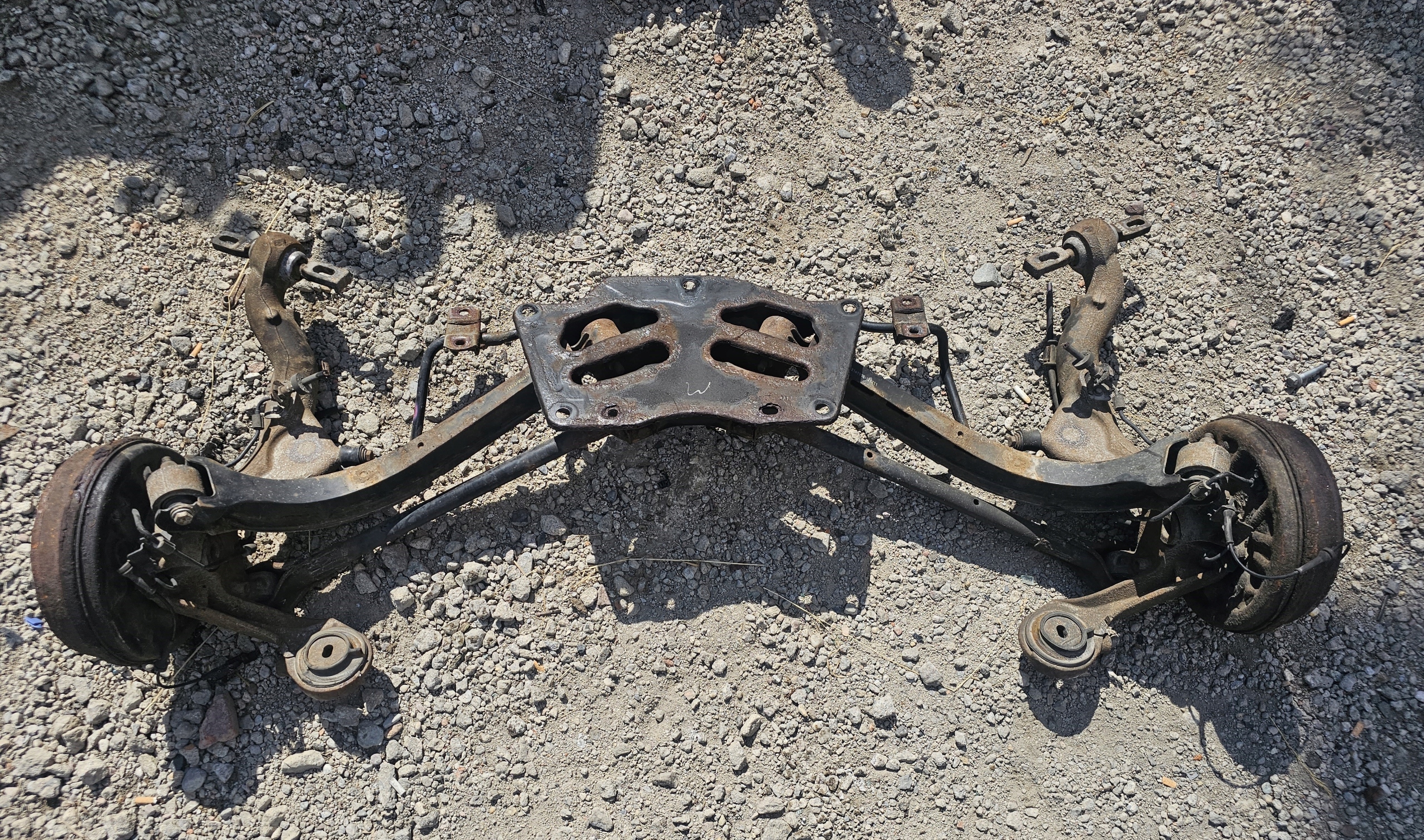 OPEL COMBO D DOBLO II 2 OS TYLNA BELKA ZAWIESZENIA TYL 1.6 DIESEL