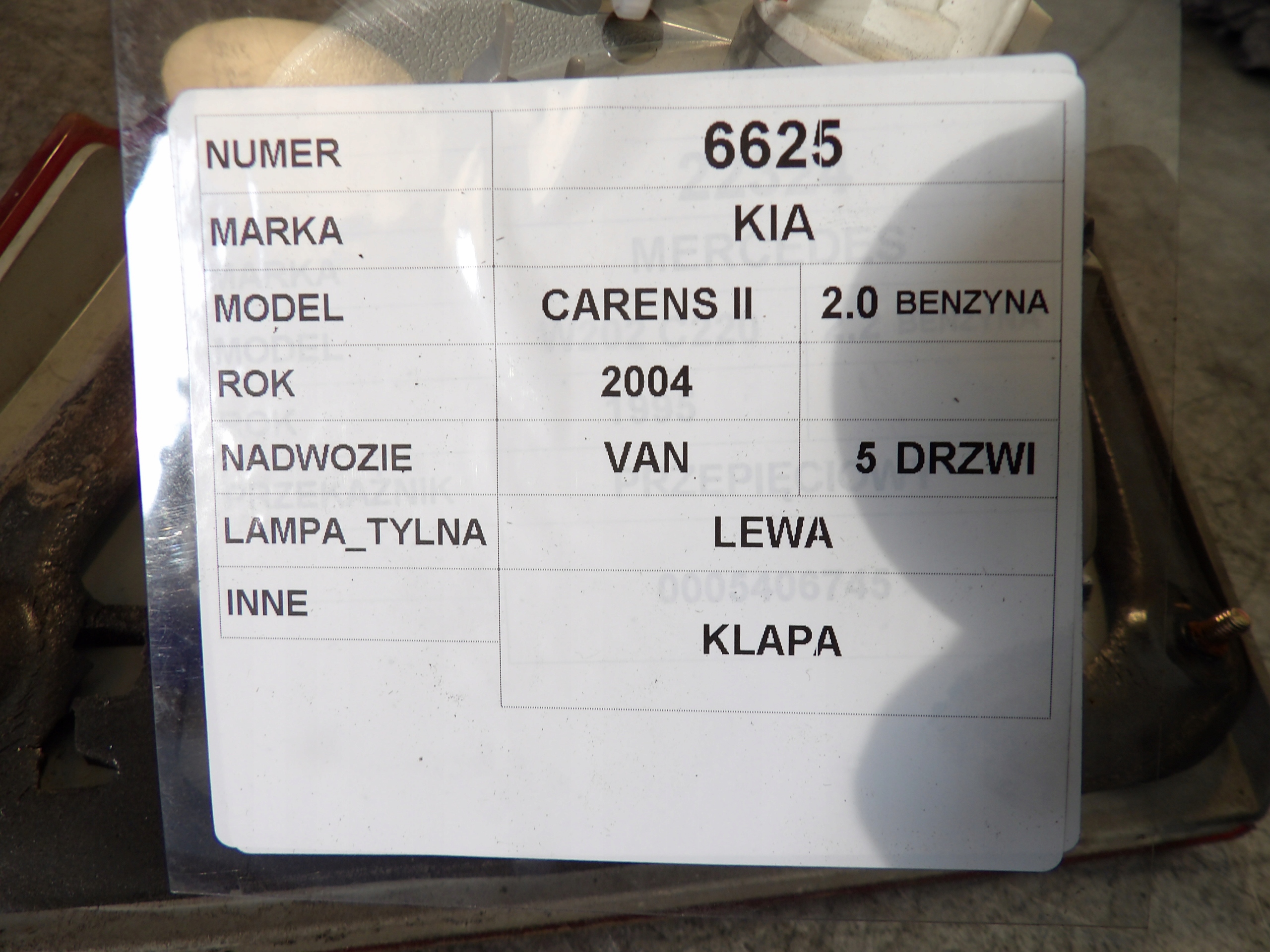 Kia Carens II light rear left trunk door