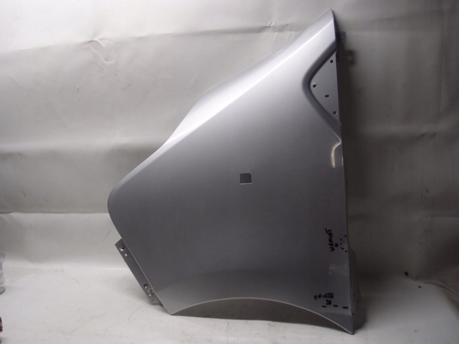 BŁOTNIK LEWY PRZÓD TRAFIC III