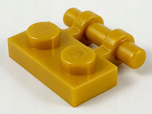 

Lego Płytka z rączką 1x2 Pearl Gold 2540 Nowy