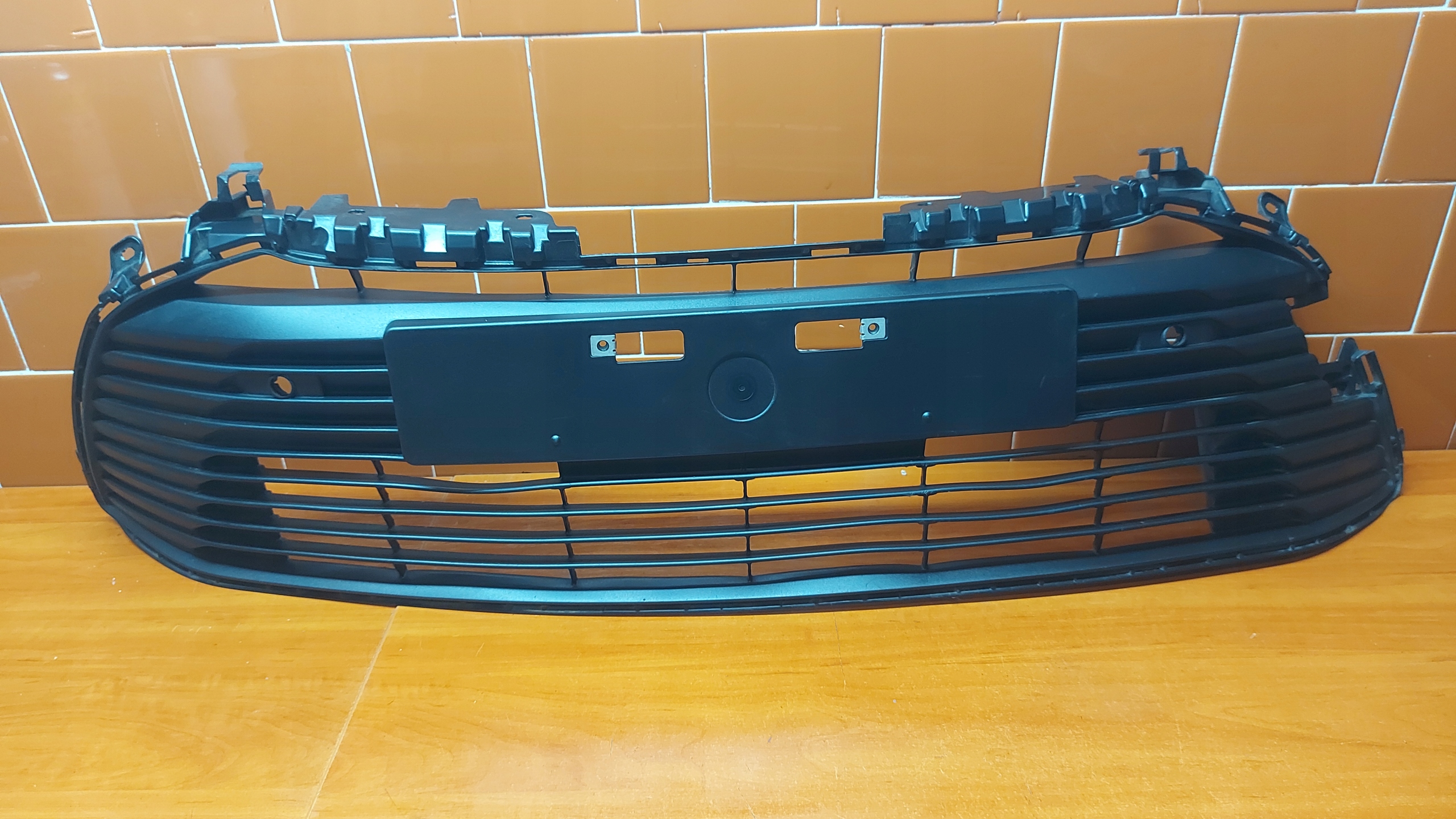 grid of a bumper central front front PDC TOYOTA COROLLA E21 sedan 19