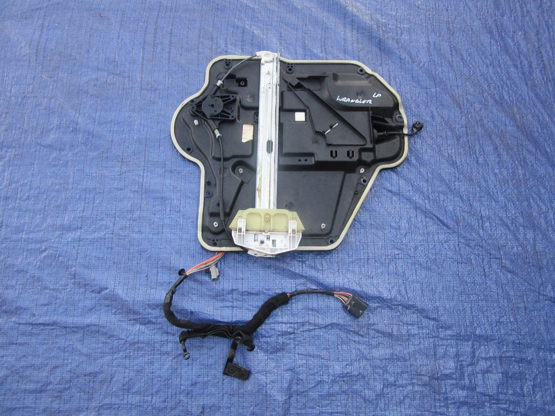 Jeep Wrangler JK 2012 4D PODNOŚNIK MECHANIZM SZYBY LEWY PRZÓD