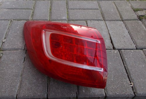KIA SPORTAGE III 10-14 LEWA TYLNA LAMPA ORYGINAŁ