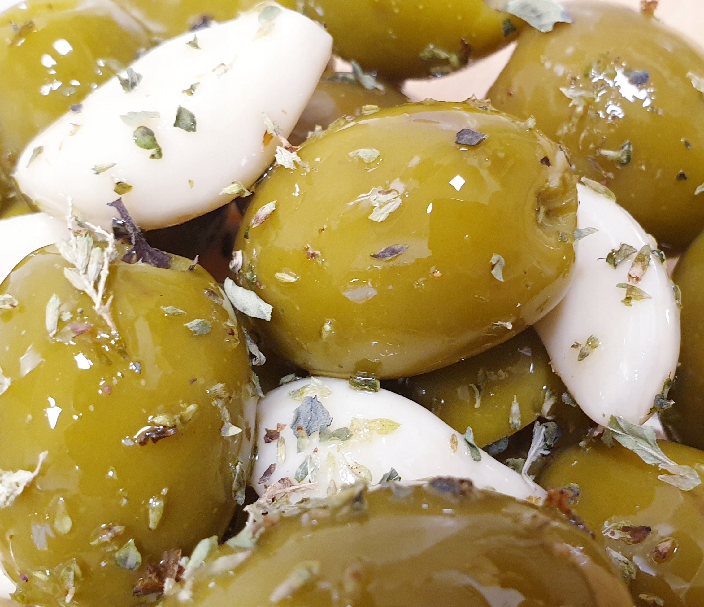 

Oliwki Zielone dryl. z czosnkiem i oregano 250 gr