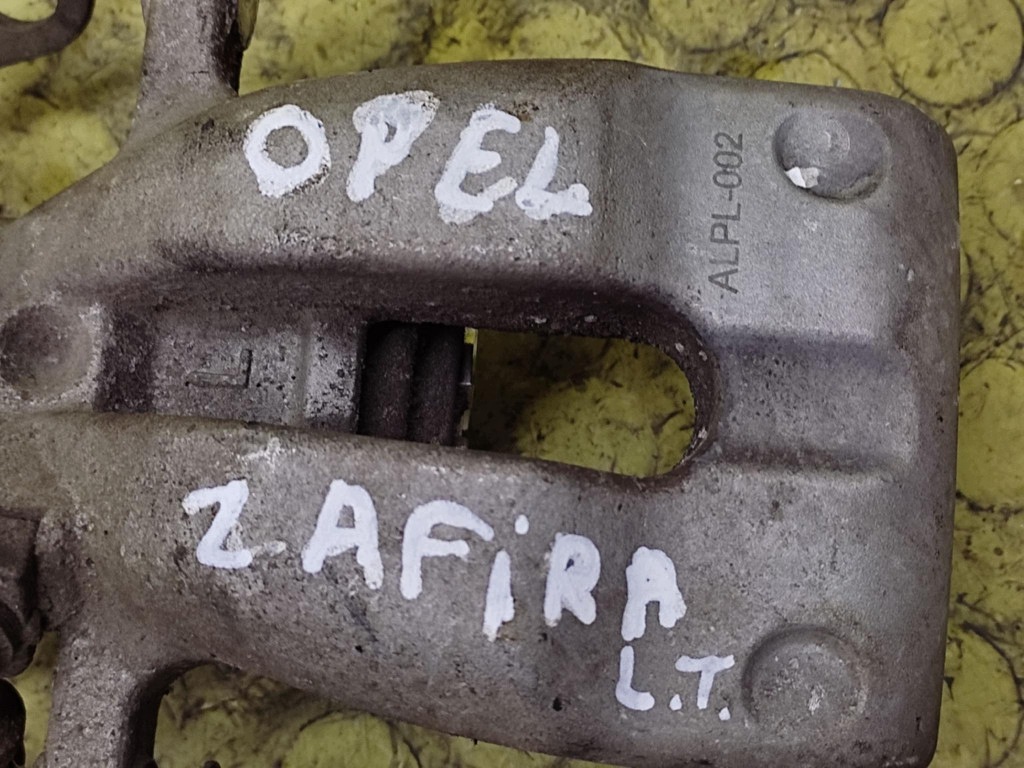 OPEL ZAFIRA A caliper HAMILCOWY left rear part