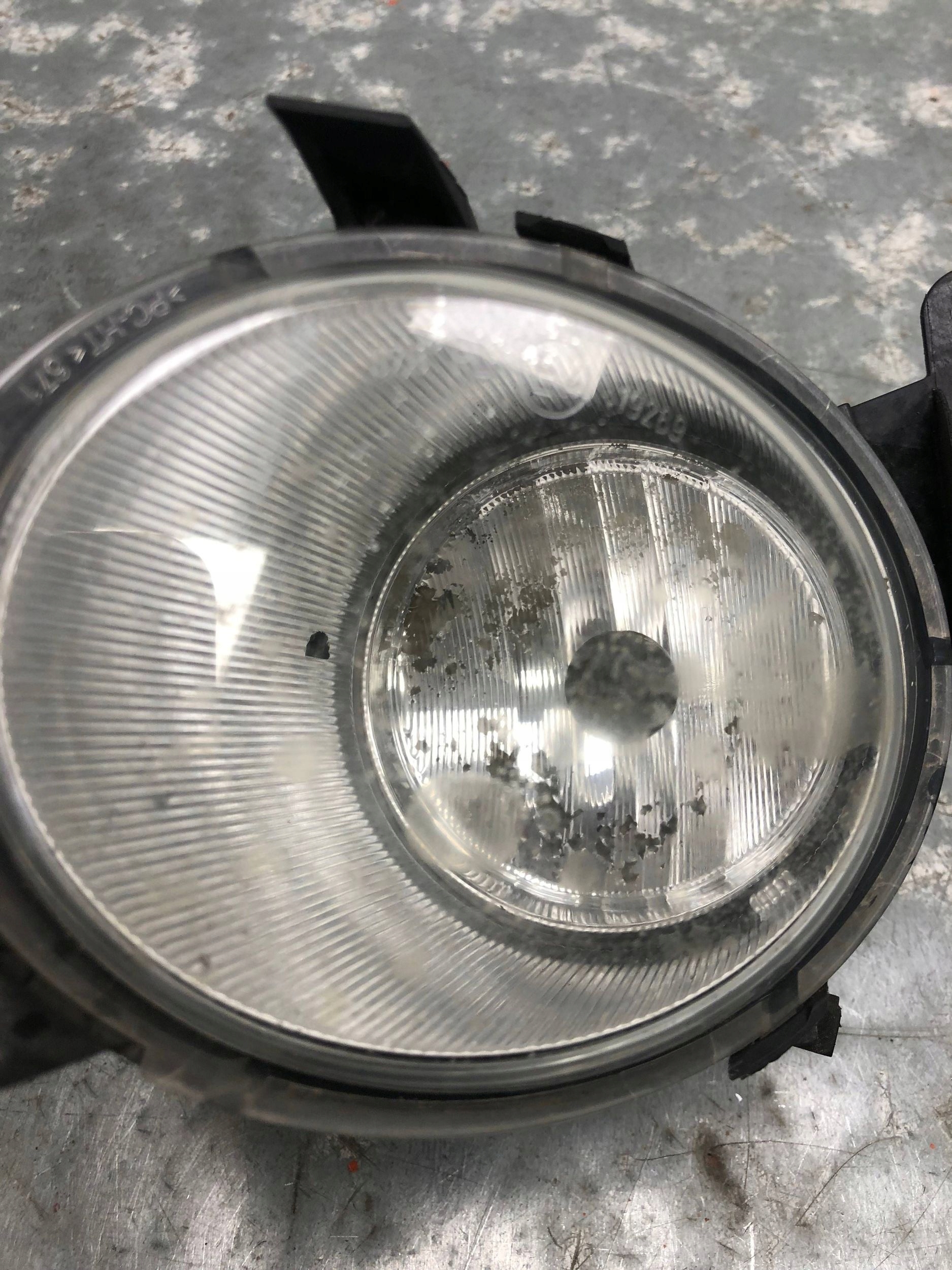 fog light left front OPEL CORSA D 13262573