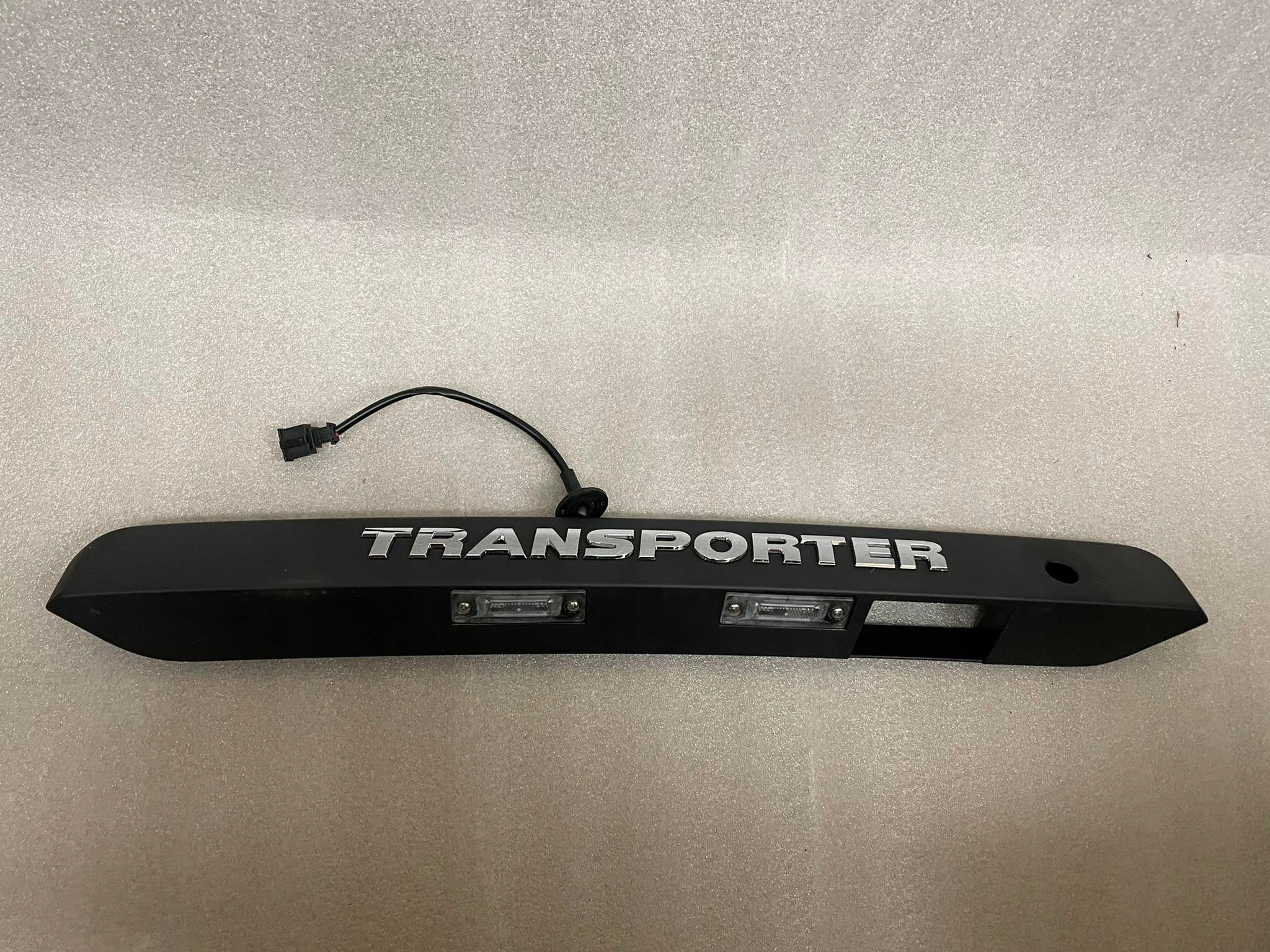 7e0 827 - VW T6.1 накладка подсветки двери задняя 7E0827574G