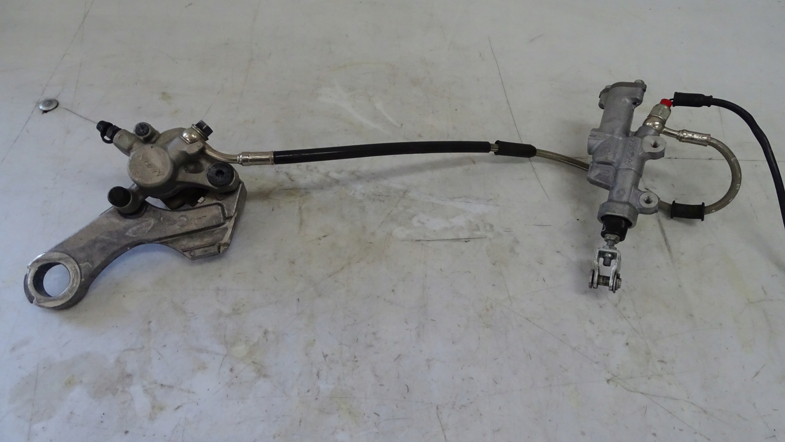 Aprilia SXV RXV 450 550 суппорт тормозной насос задний