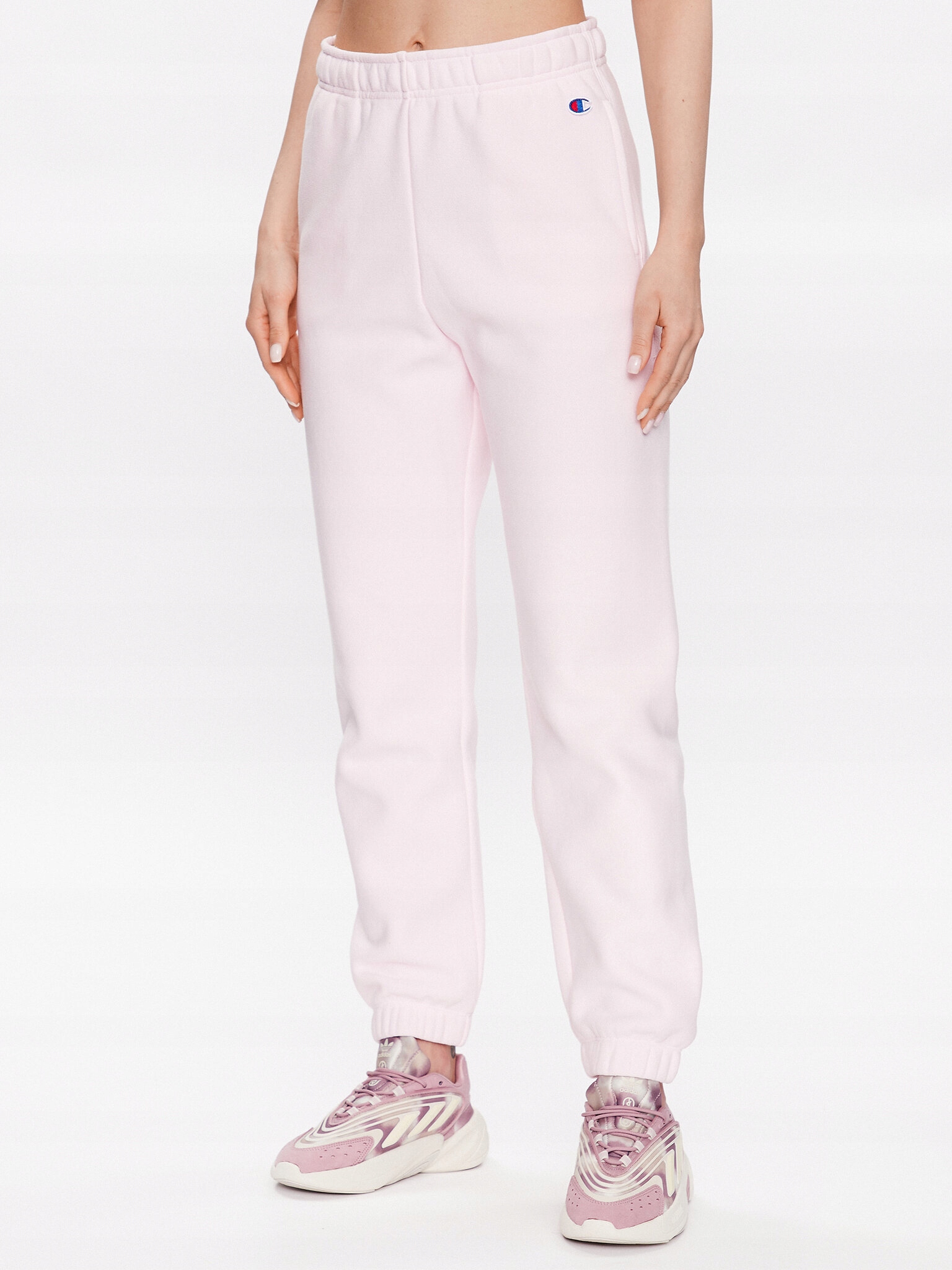 Champion Spodnie dresowe 116243 Różowy Regular Fit