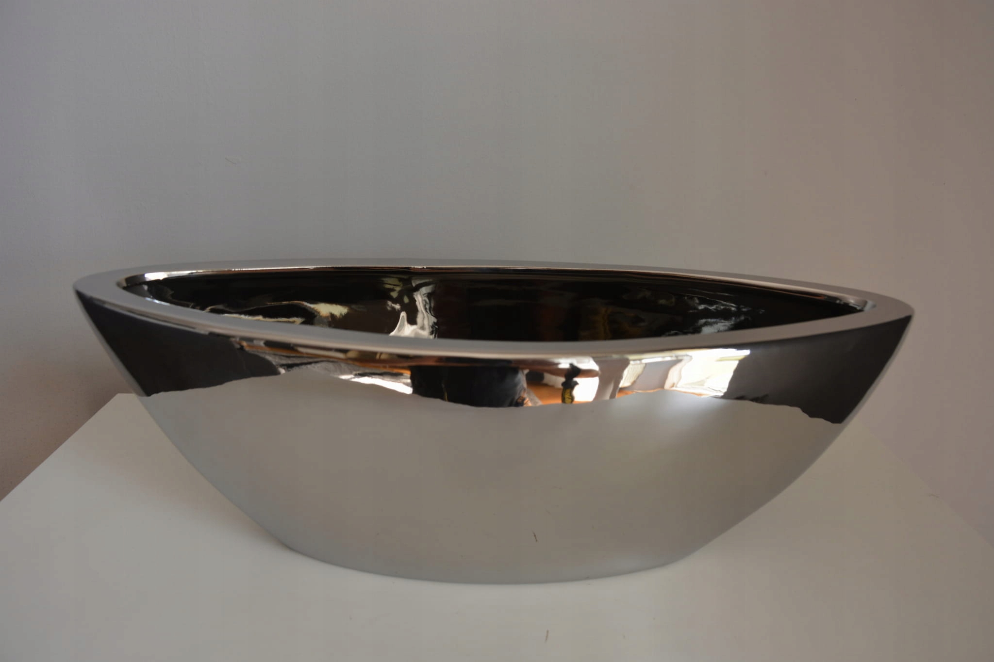 

Osłonka ceramiczna srebrna 40x14x14 cm