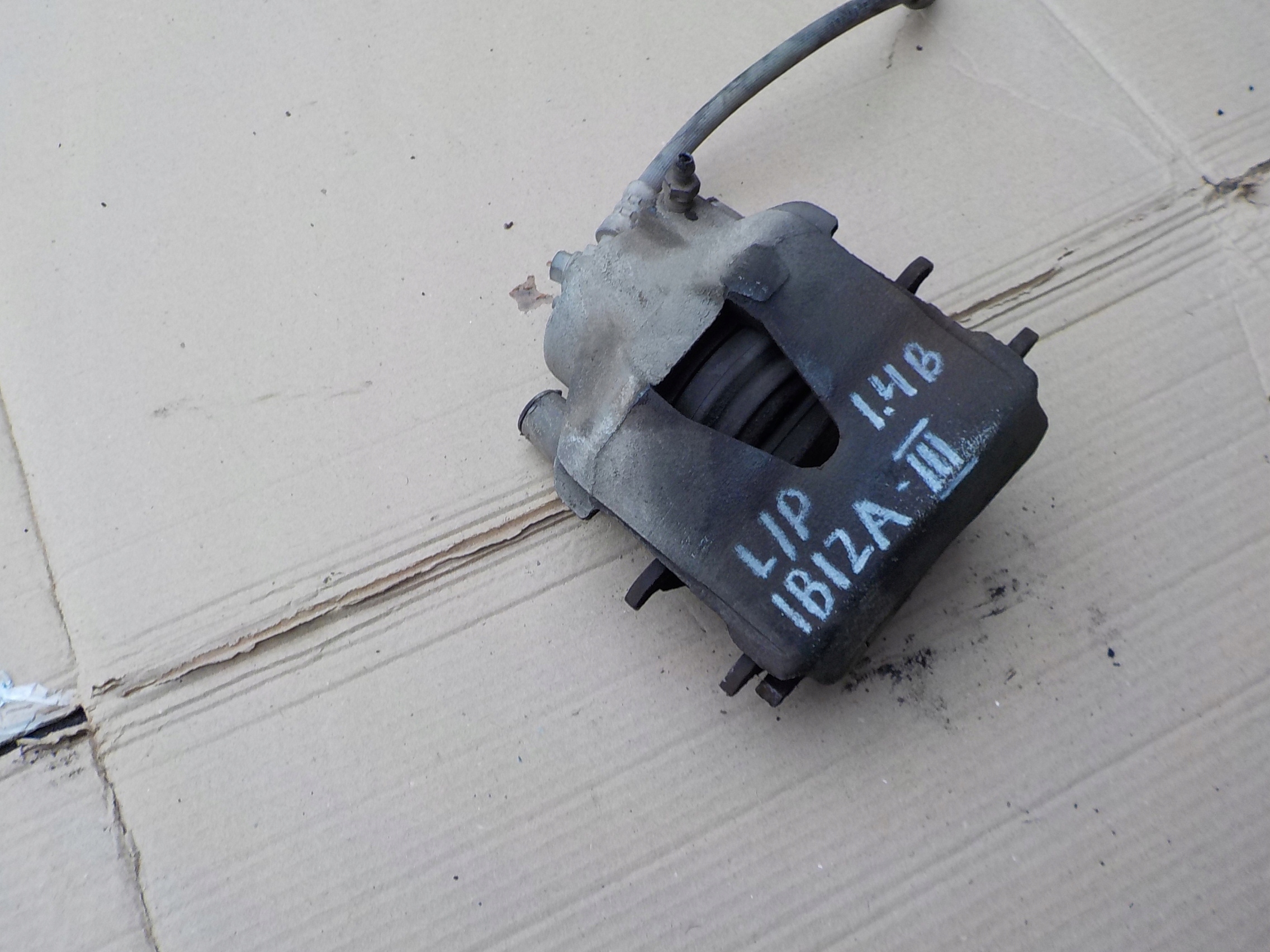caliper brake left front seat ibiza III 1,4 16v 2008r