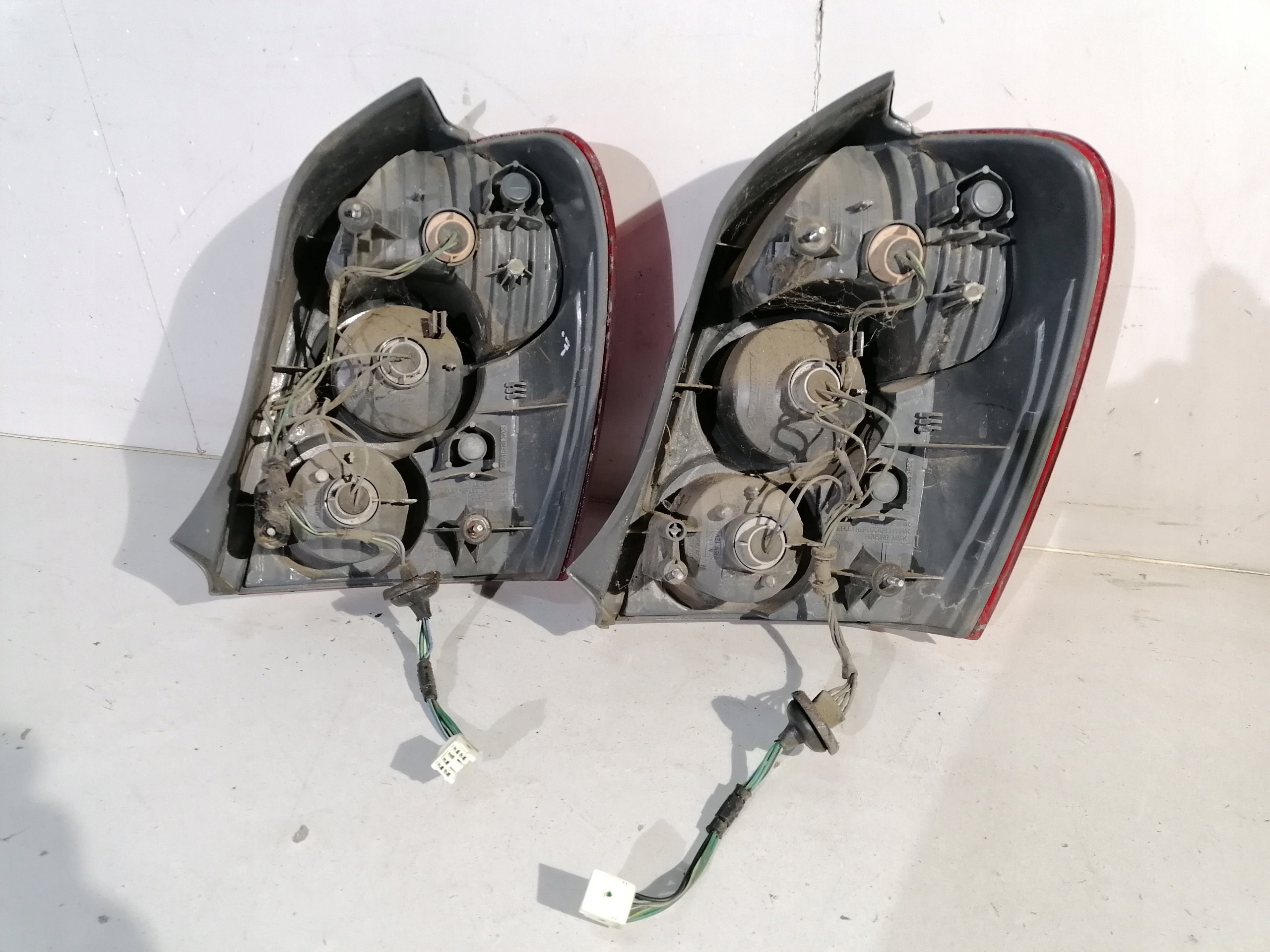 Mazda 323F BJ lift lights left and right rear part rear