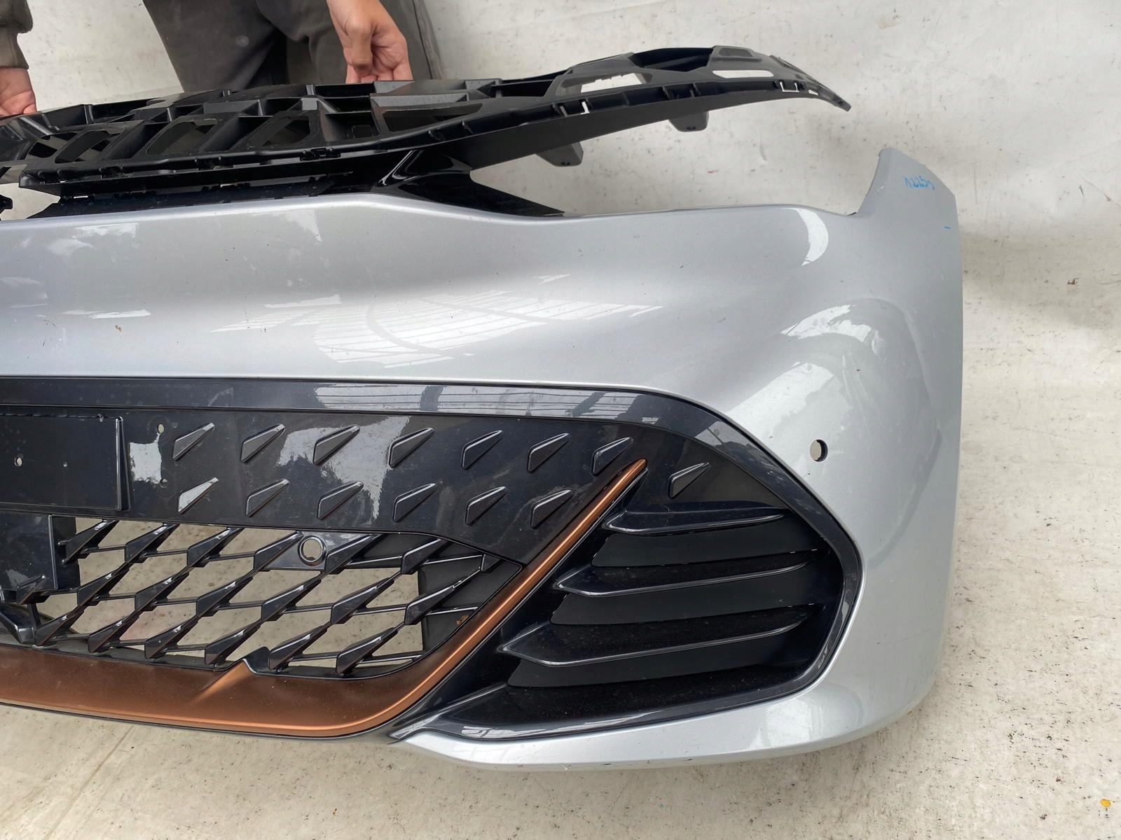 CUPRA BORN 10E 21- bumper front front grid cover support 10E807217H