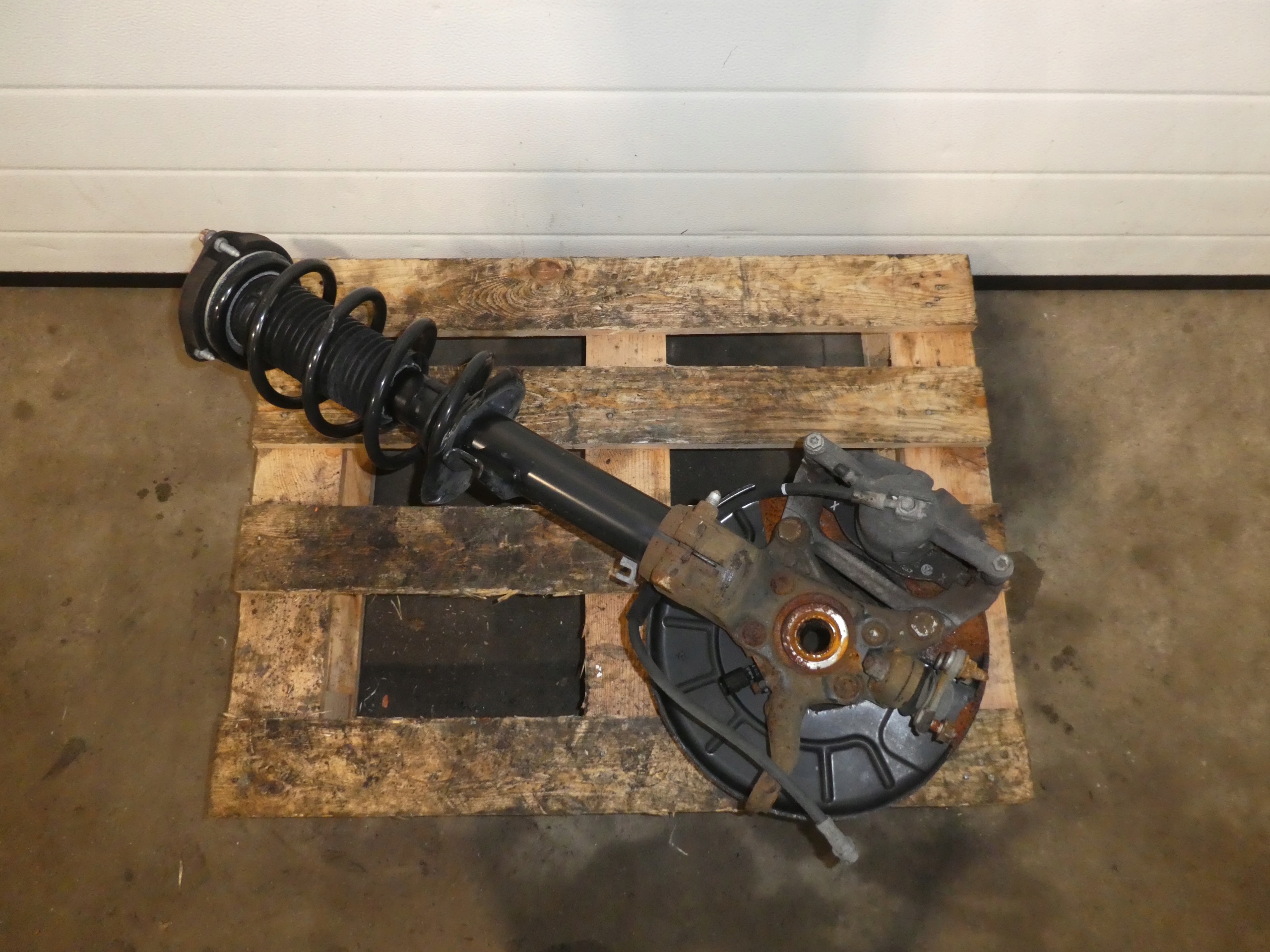 swing McPherson front VW CADDY IV 2K5413031