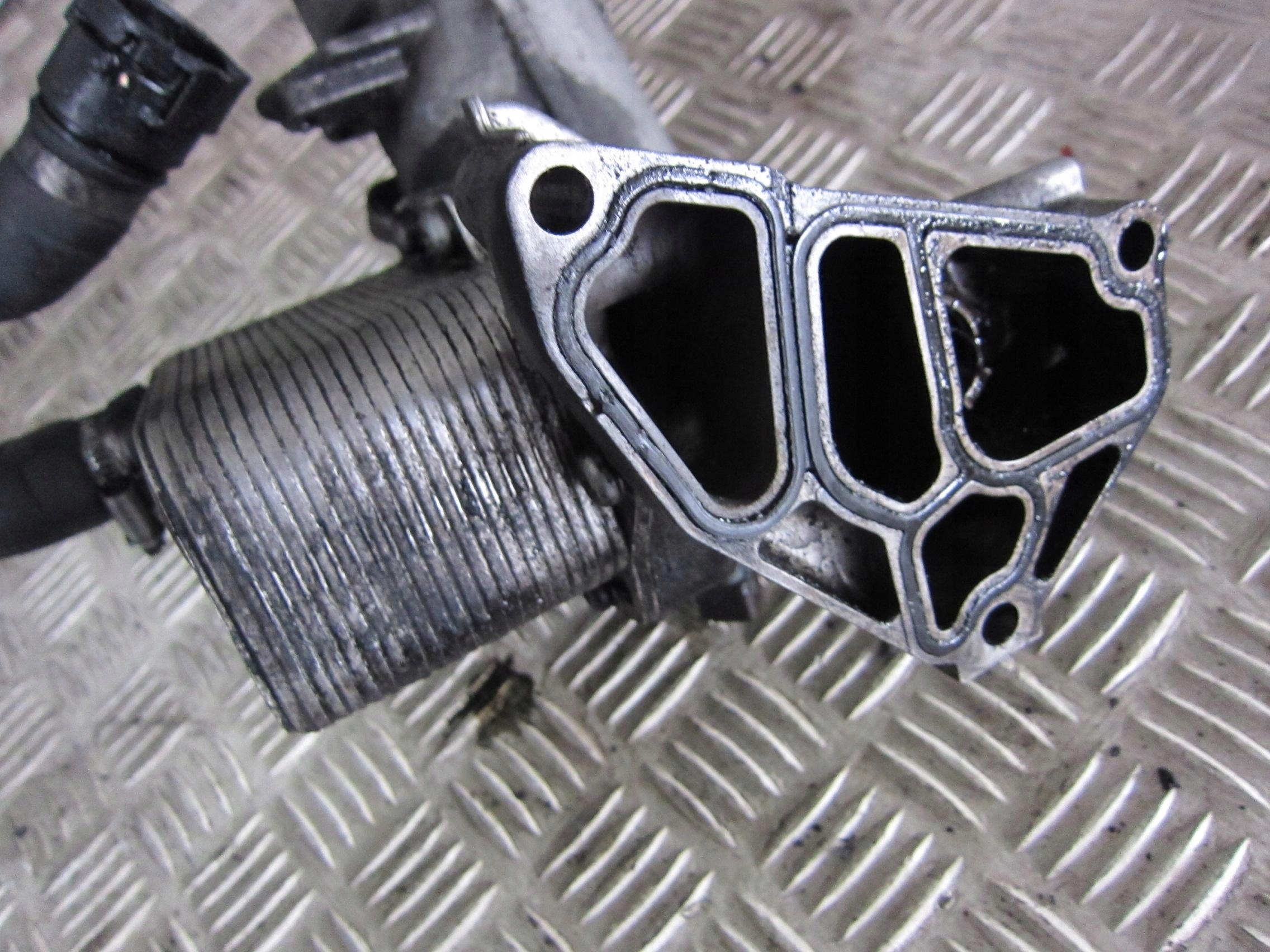 BMW E60 radiator oil filter holder 7788453