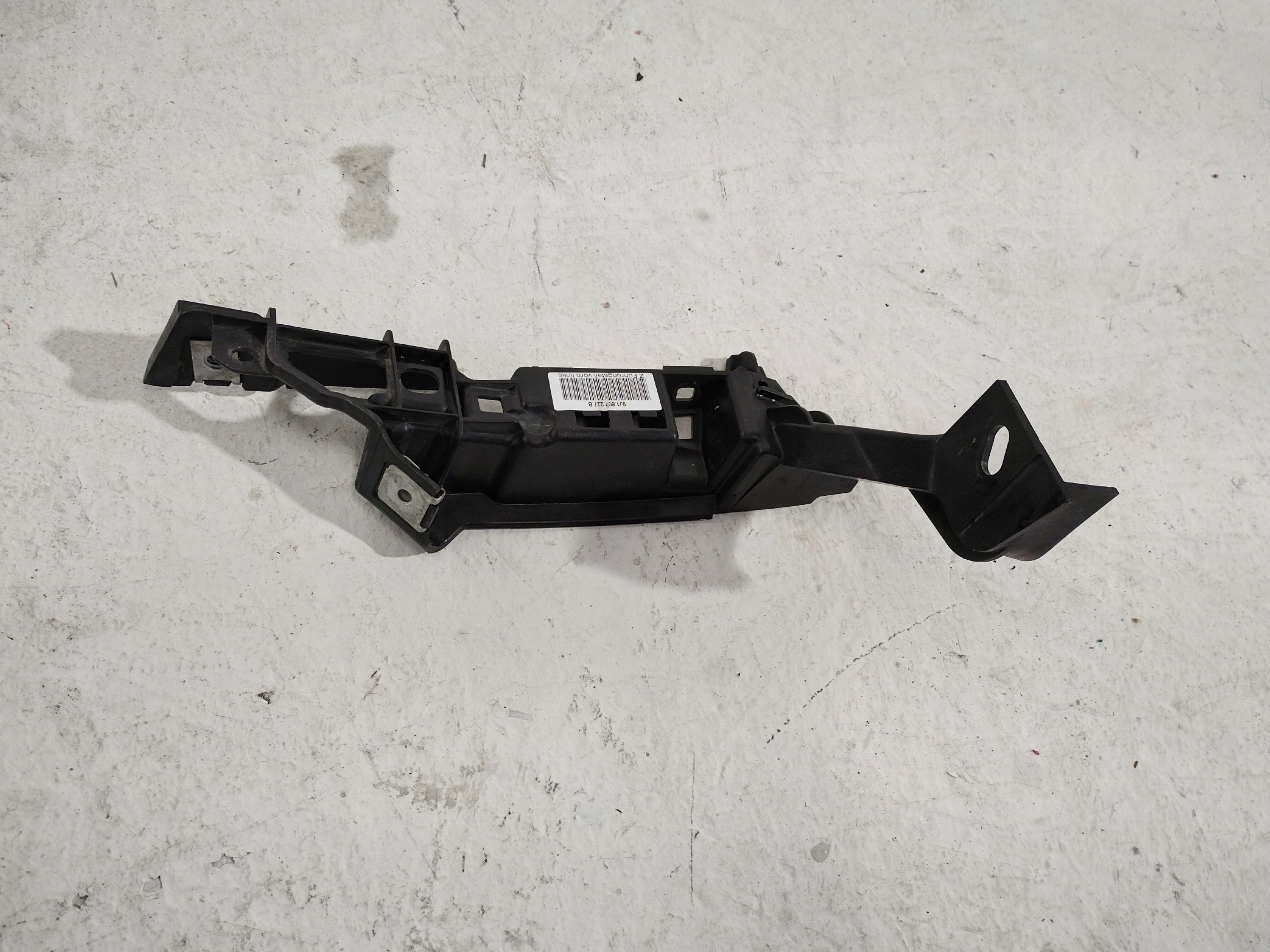 9J1.807.233.B - PORSCHE TAYCAN ПРОСКАЛЬЗЫВАНИЕ КРЕПЛЕНИЕ БАМПЕРА ЗАДНИЙ ЛЕВЫЙ