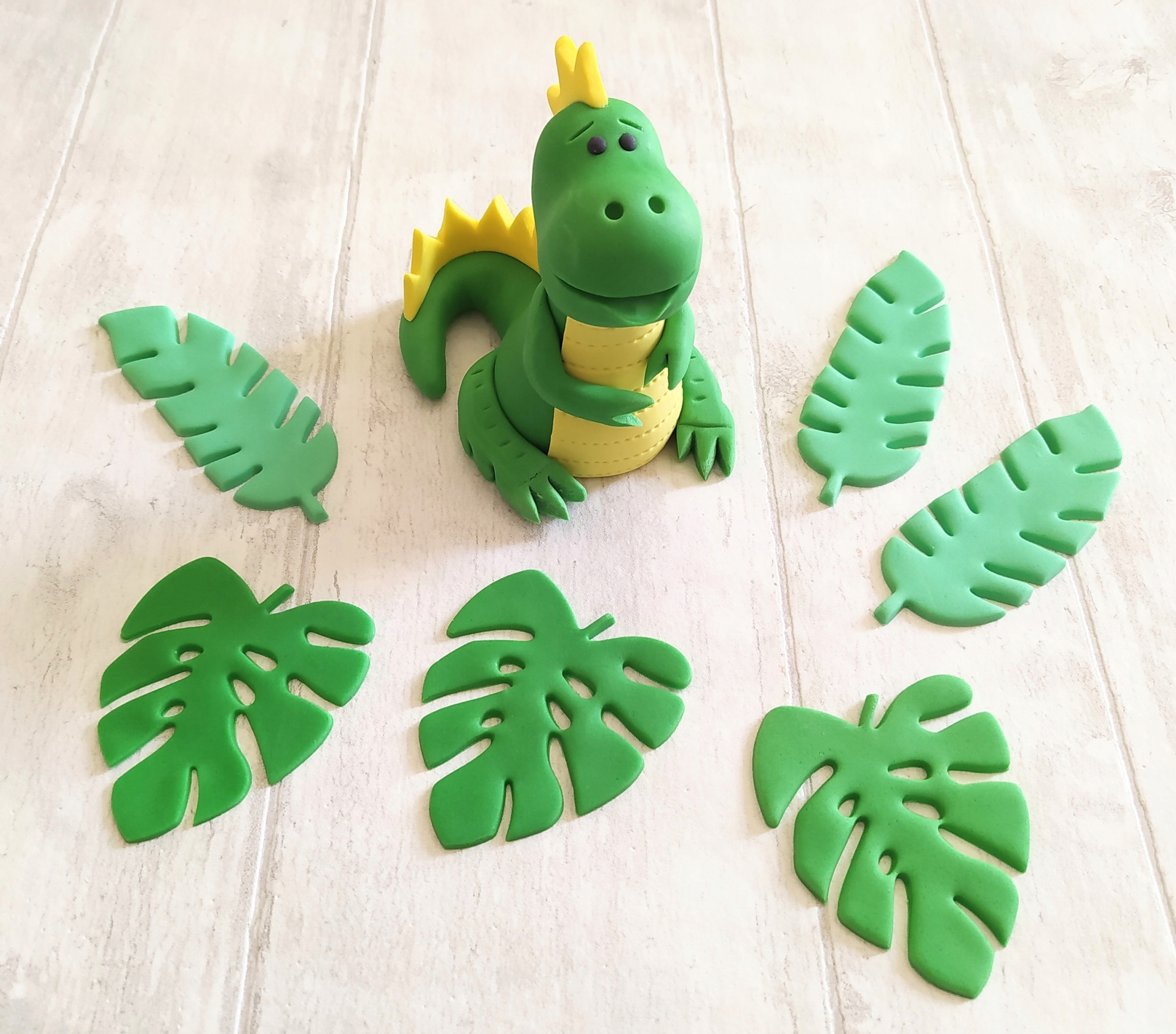 Levně Dinosaurus T-rex dino listy 6 Ks na dort Sada dekorací z cukrové hmoty