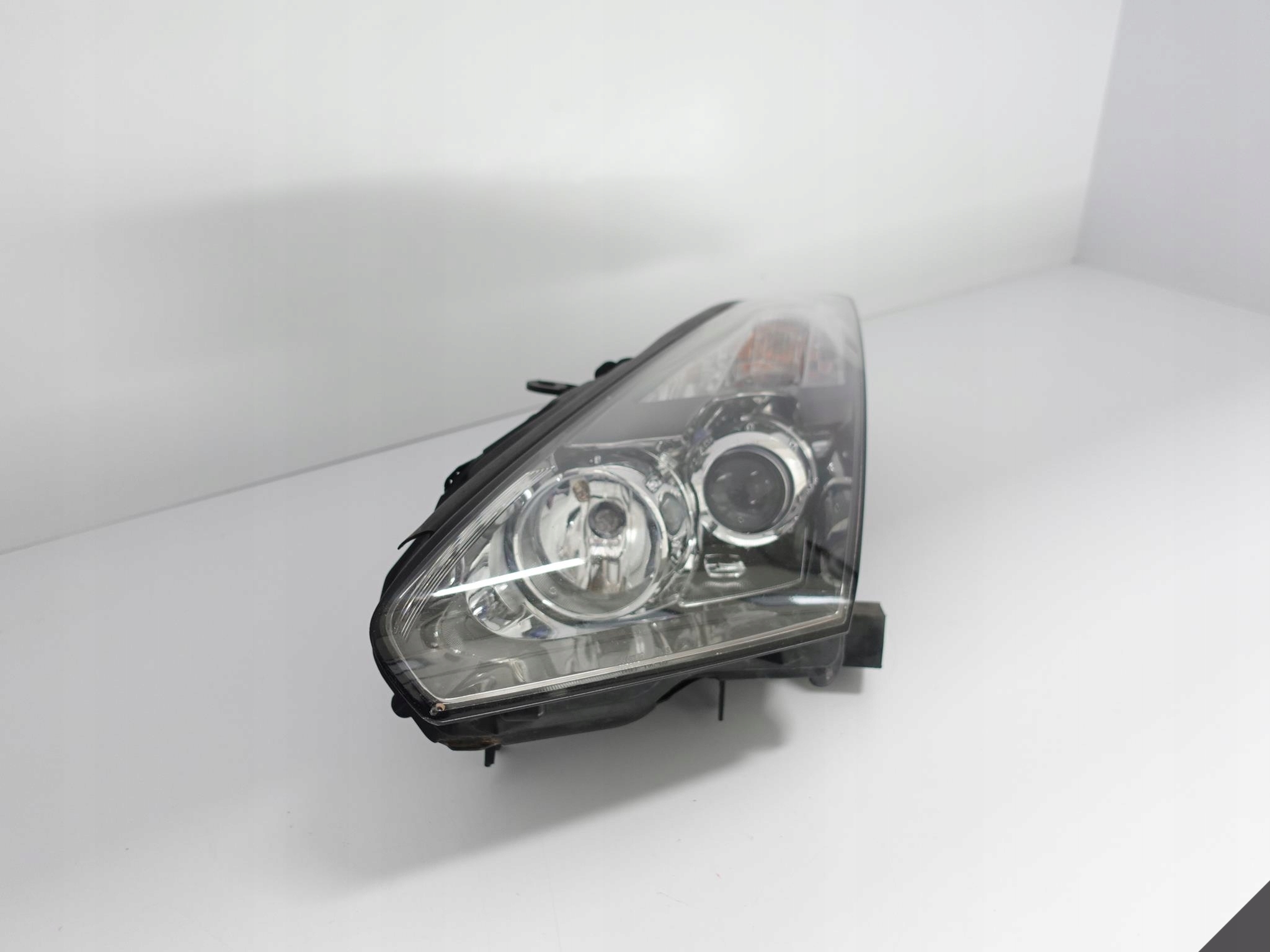NISSAN GTR GT-R R35 08- LAMPA XENON LEWA EUROPA Producent części Nissan OE
