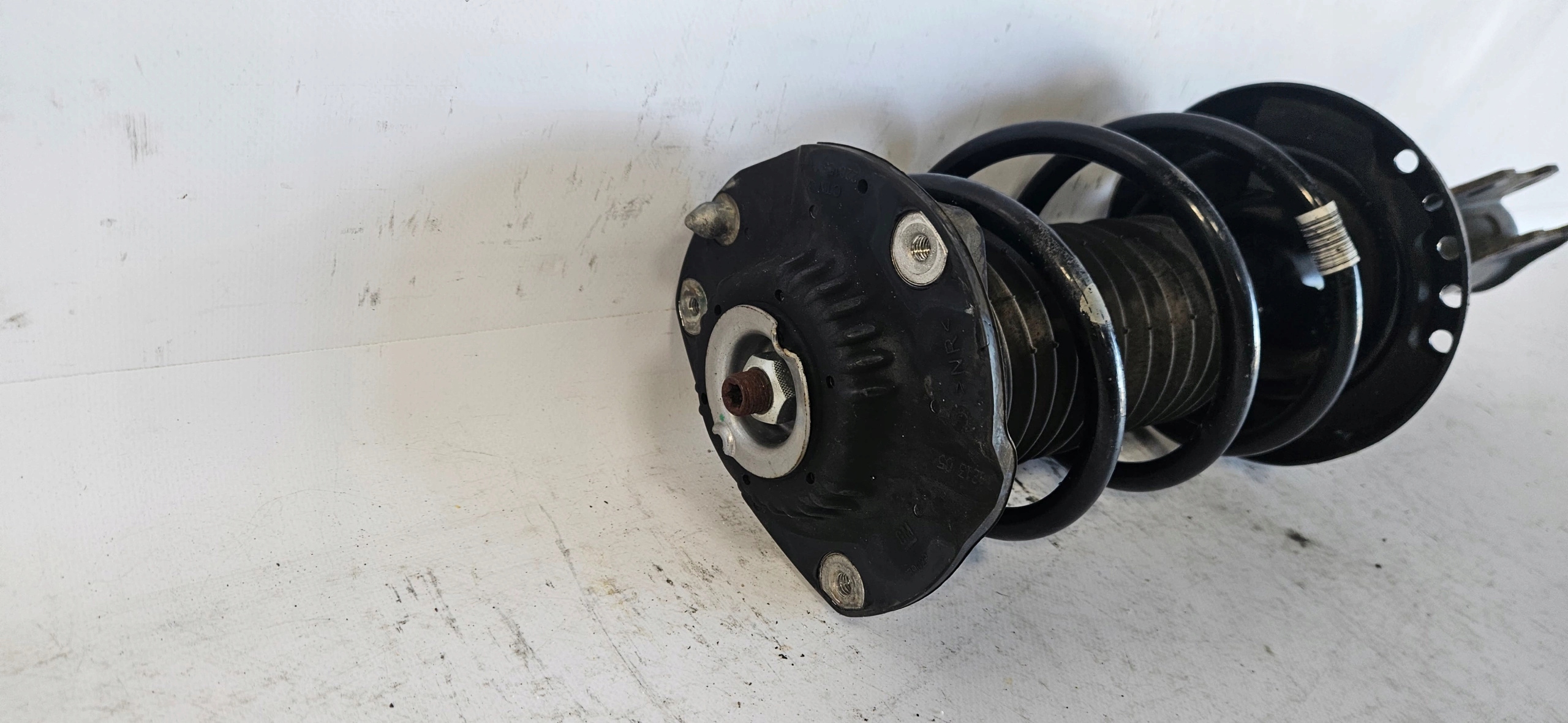 shock absorber left front OPEL ASTRA V K 39039563