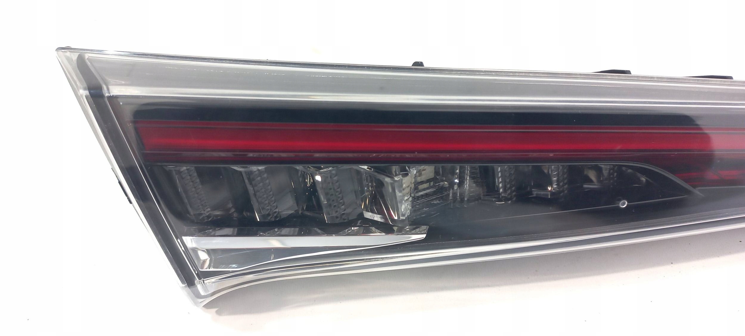 Toyota Corolla E210 E21 light of the rear bonnet boot left 02429 (R318)