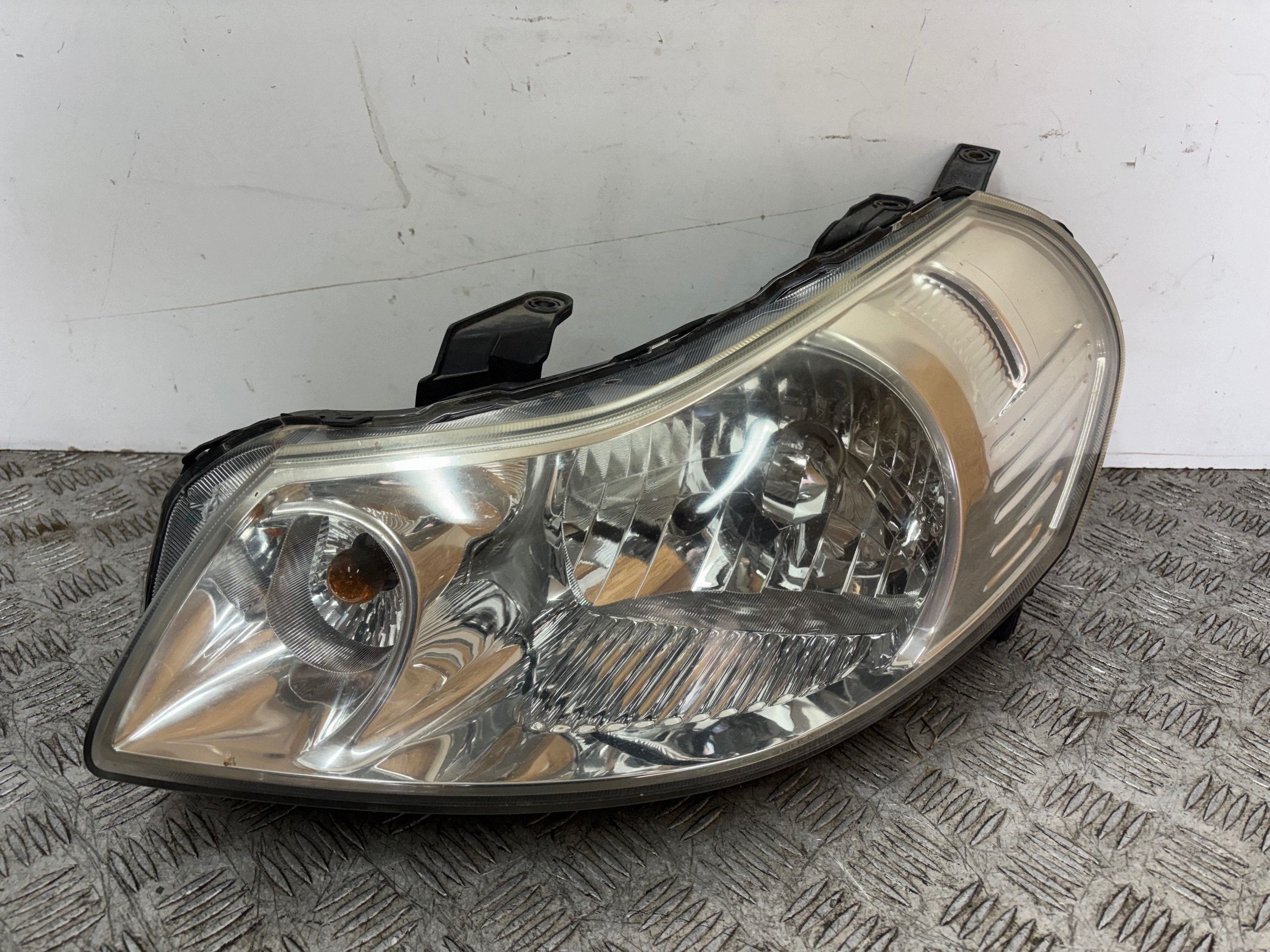 REFLEKTOR light left FIAT SEDICI SUZUKI SX4