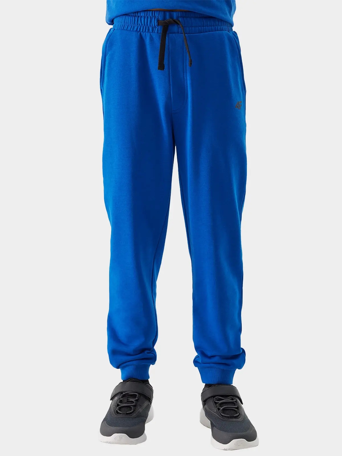 SPODNIE DRESOWE CHŁOPIĘCE 4F JUNIOR DRESY DZIECIĘCE BAWEŁNA SPORT SS24M591 Kolor niebieski