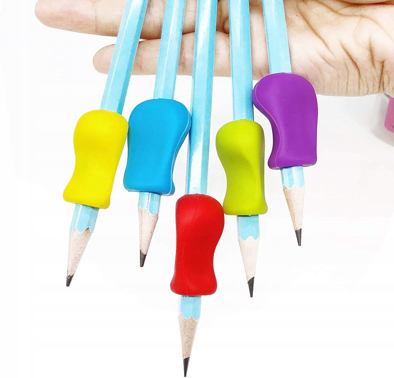 NAKŁADKI DO NAUKI PISANIA NA OŁÓWEK DŁUGOPIS 4 szt KORYGUJĄCE PALCE GUMOWE Waga produktu z opakowaniem jednostkowym 0.1 kg