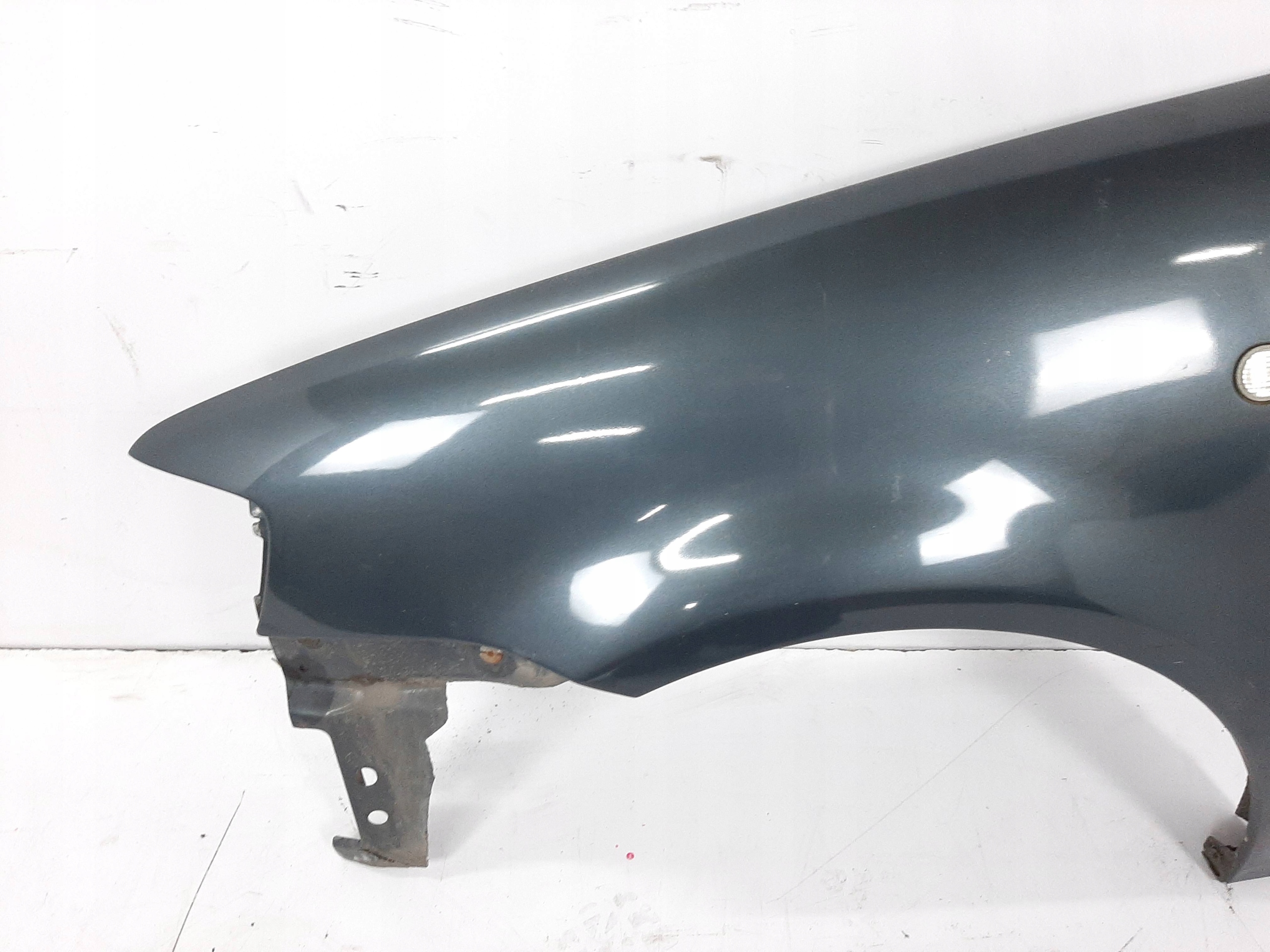 VW POLO 6N2 00R BLOTNIK LEWY PRZOD KOD LC7V Wersja Europejska