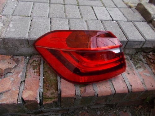 BMW 2 F45 LEWA TYLNA LAMPA ZWYKŁA 7311029-14 ORYGINAŁ