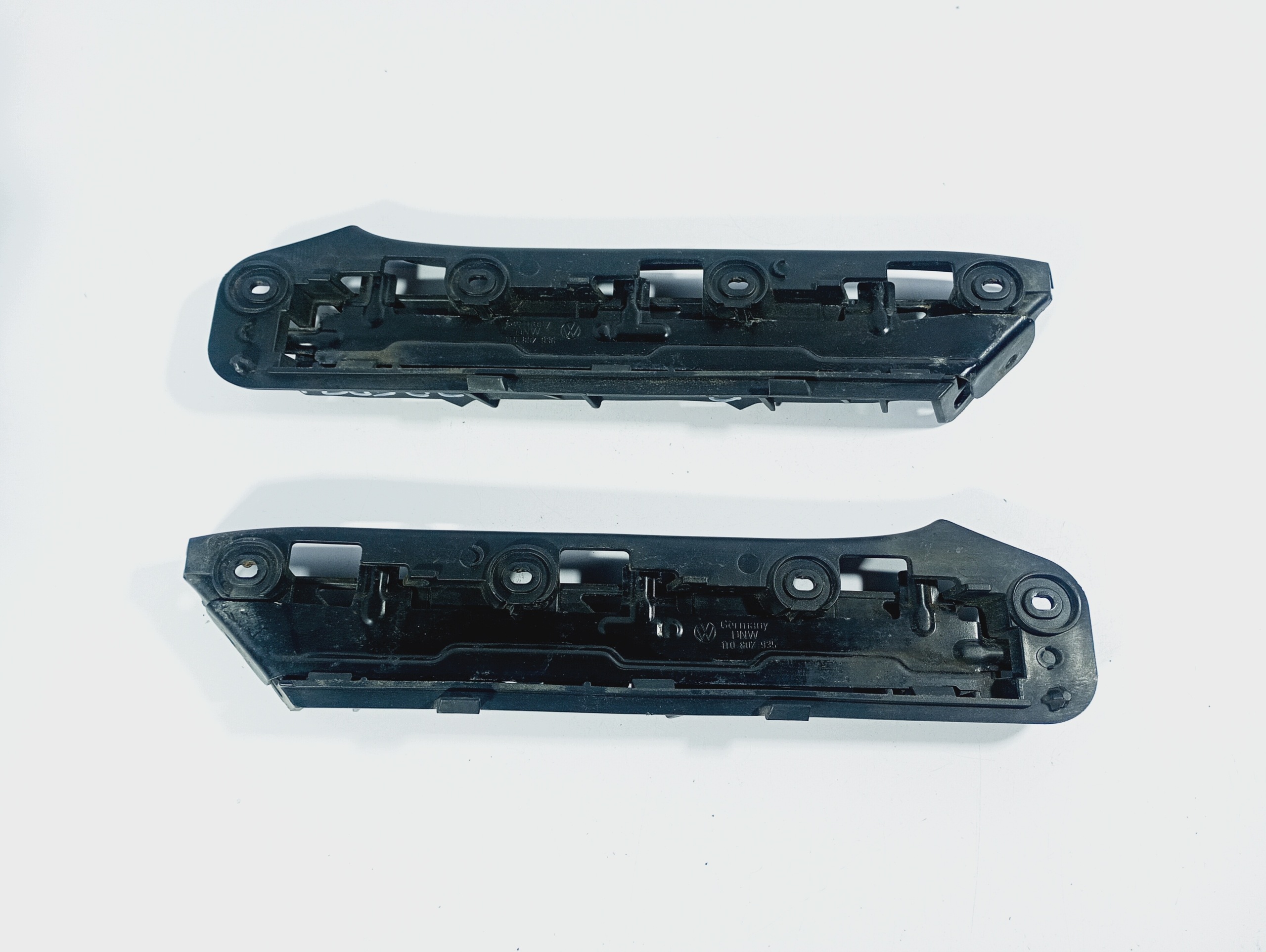 moulding bumper bracket left right front OE 1T0807049 VW CADDY 3 III 04-10