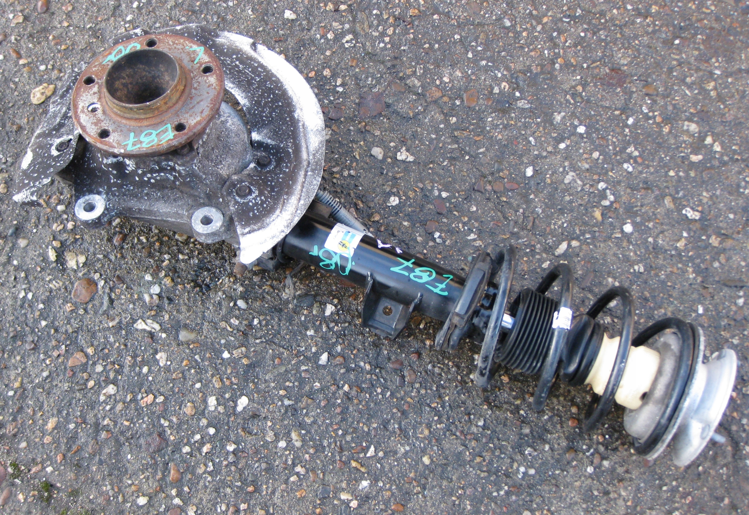 BMW 1 E87 08R. MCPERSON swing shock absorber left front
